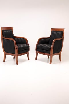 Coppia di poltrone Bergère in mogano, stile classico/impero, inizio XIX secolo