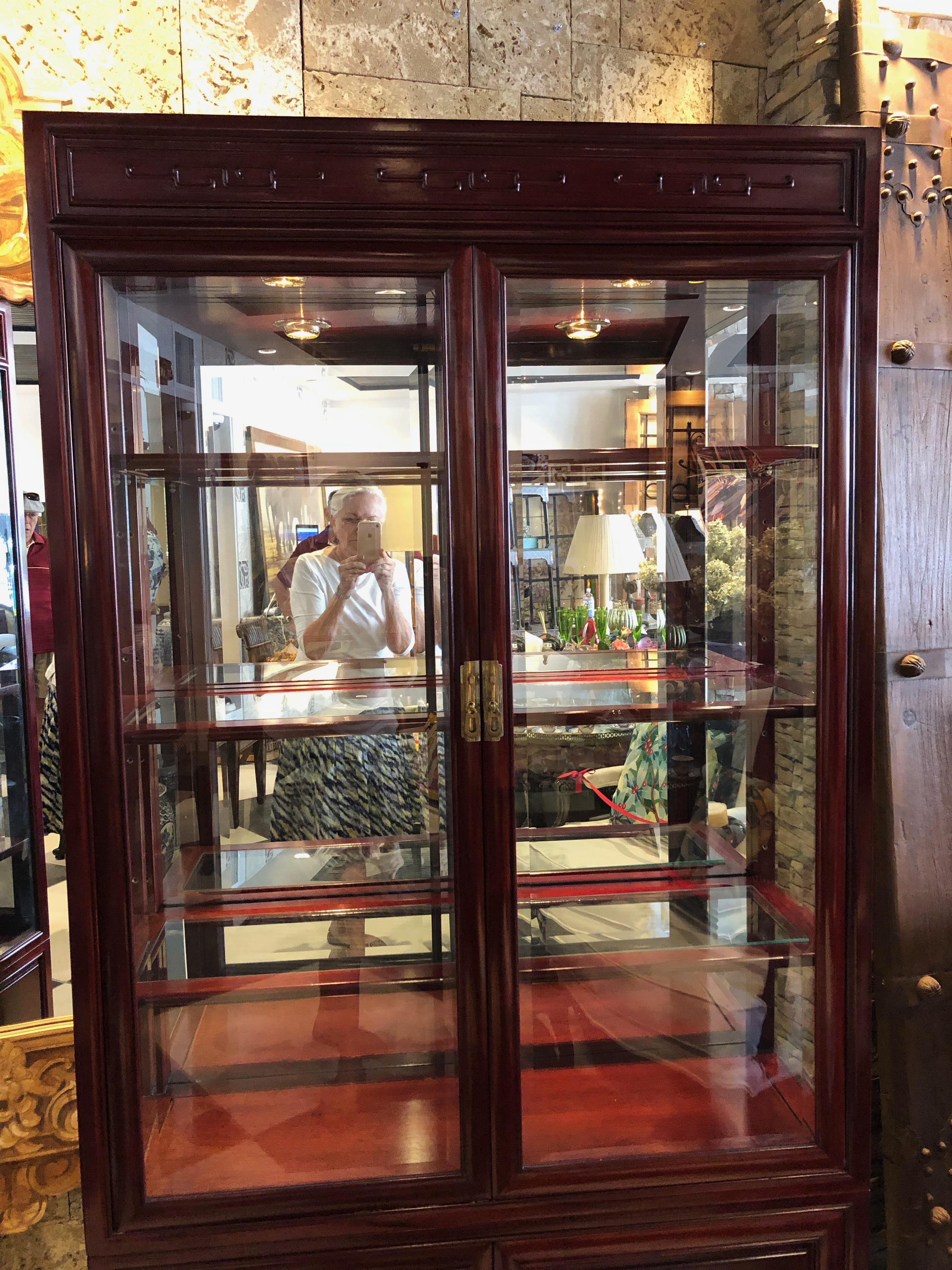 Machine-Made Pair of American Mahogany Cabinets in the Chinese style by John Widdicomb For Sale