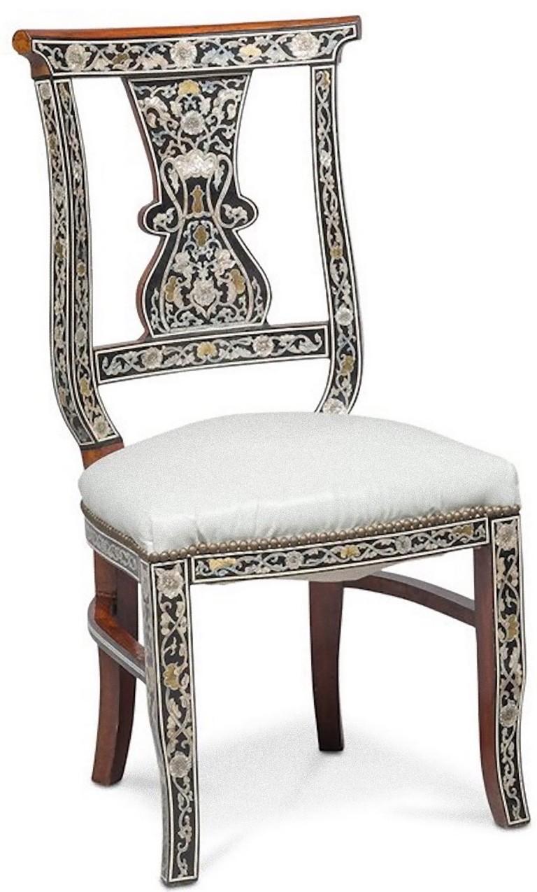 Pair of mahogany chairs is a piece of original design furniture realized in the early 20th century by Arab Manufacture.

A unique pair of mahogany chairs with mother of pearl inlays: black lacquer base, decorated with vegetable motifs.

Very