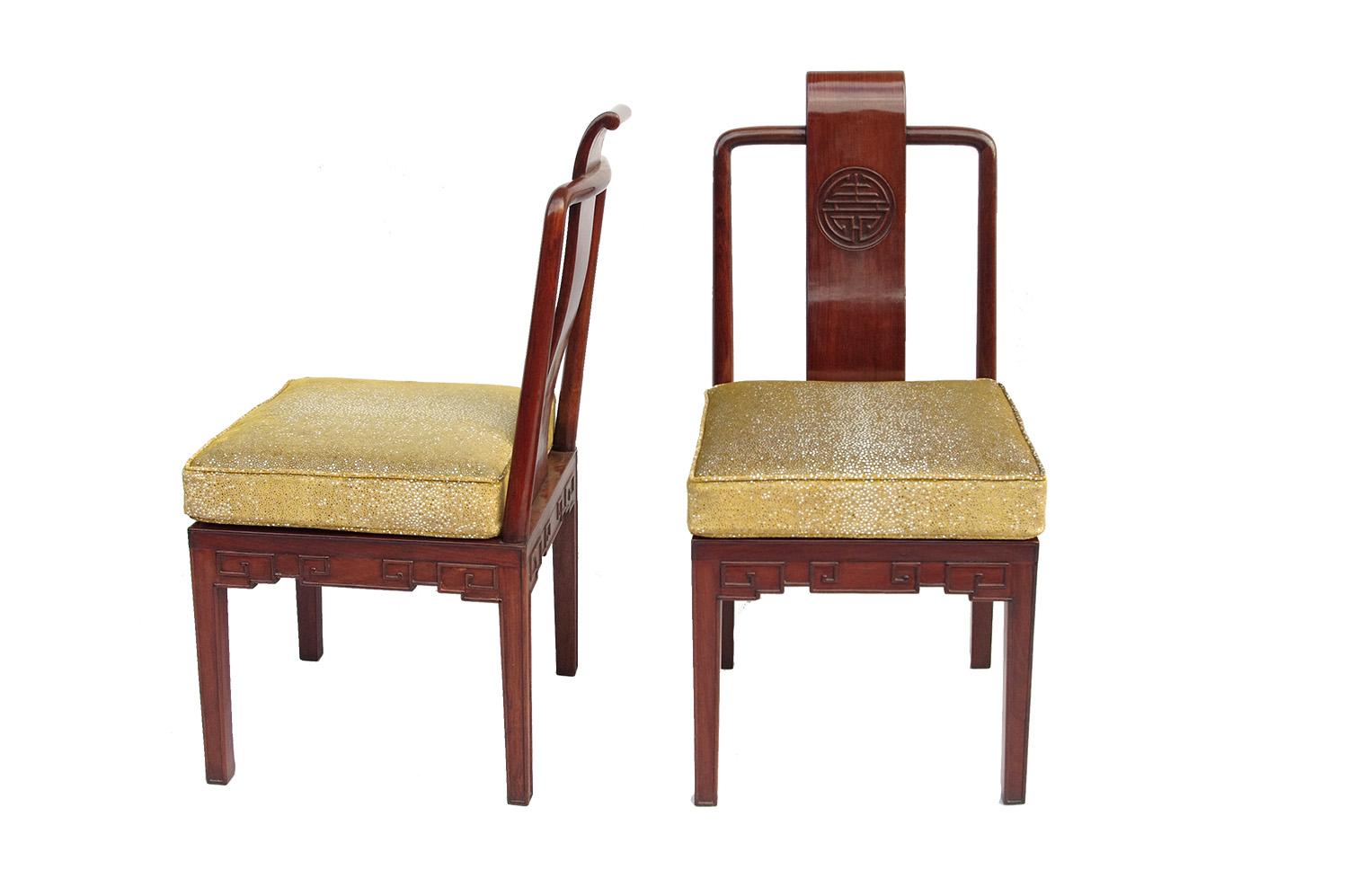 Pair of Chinese Ming dynasty style chairs standing on four square section legs. Square with rounded corners openwork backseat with circular-section rails adorned with an S-shaped back splat that is reversed on the top and exceeds a little bit above