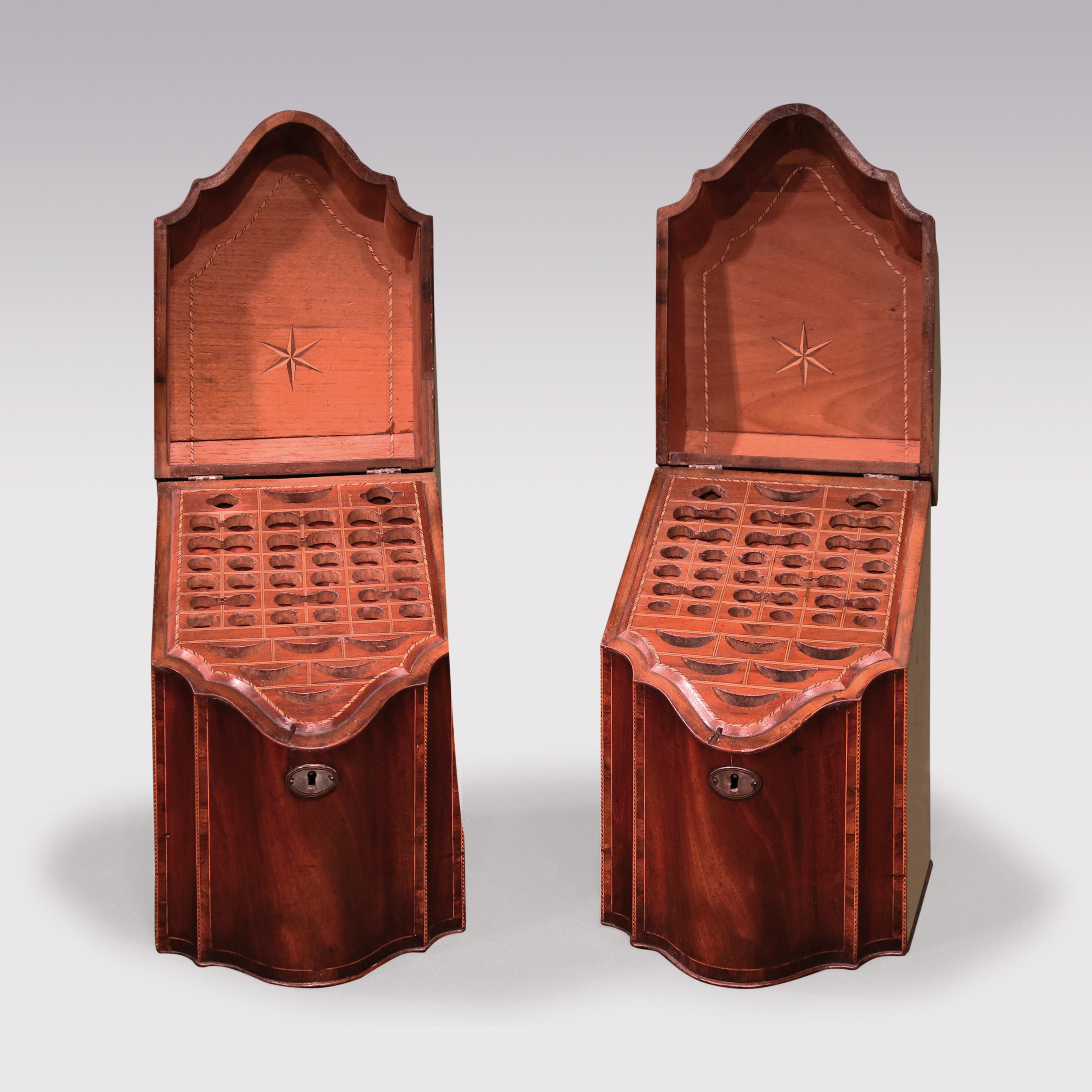 A pair of late 18th century George III period well-figured mahogany cutlery boxes retaining original interiors, chequered strung and crossbanded throughout, having double serpentine fronts with original silver escutcheons and handles.