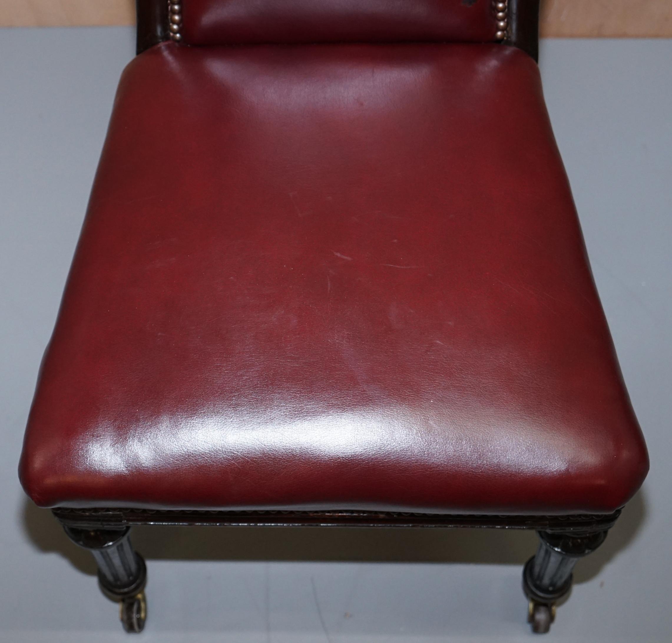 Hand-Crafted Pair of Mahogany Framed Oxblood Leather Medallion Back Side Occasional Chairs