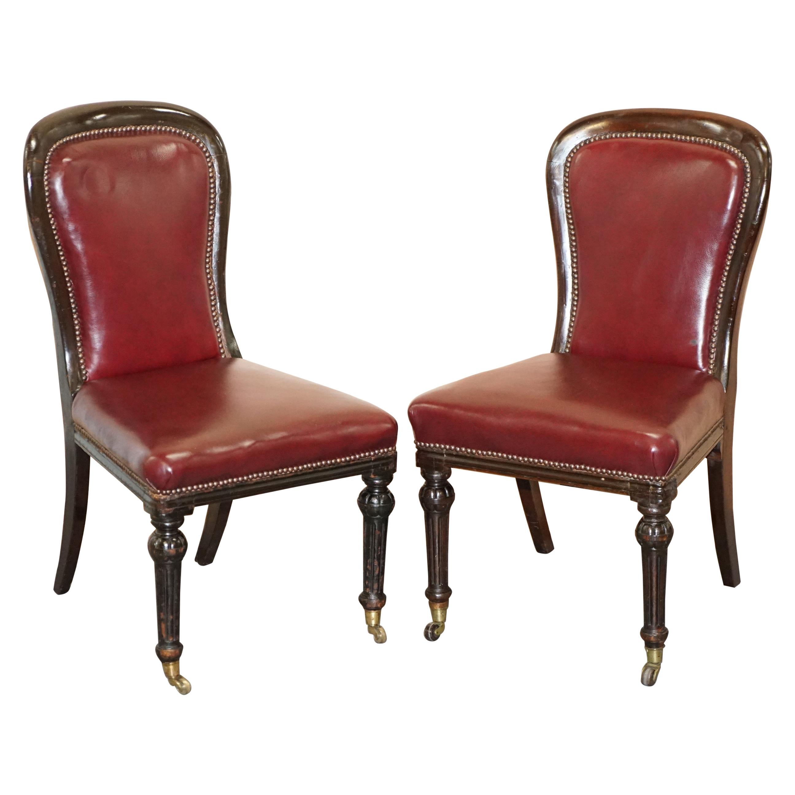 Pair of Mahogany Framed Oxblood Leather Medallion Back Side Occasional Chairs