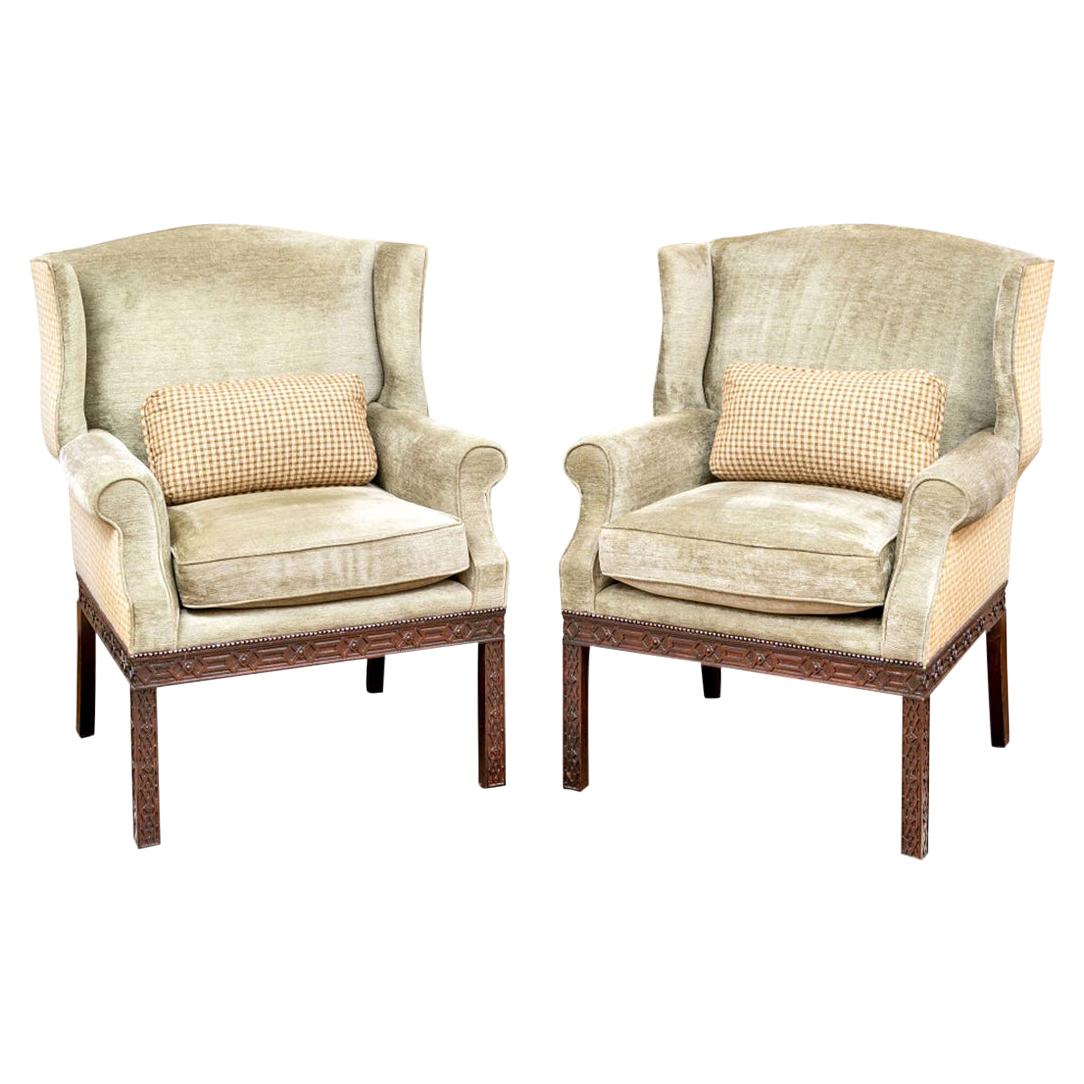 Pair of Mahogany Framed Wing Chairs from John Rosselli