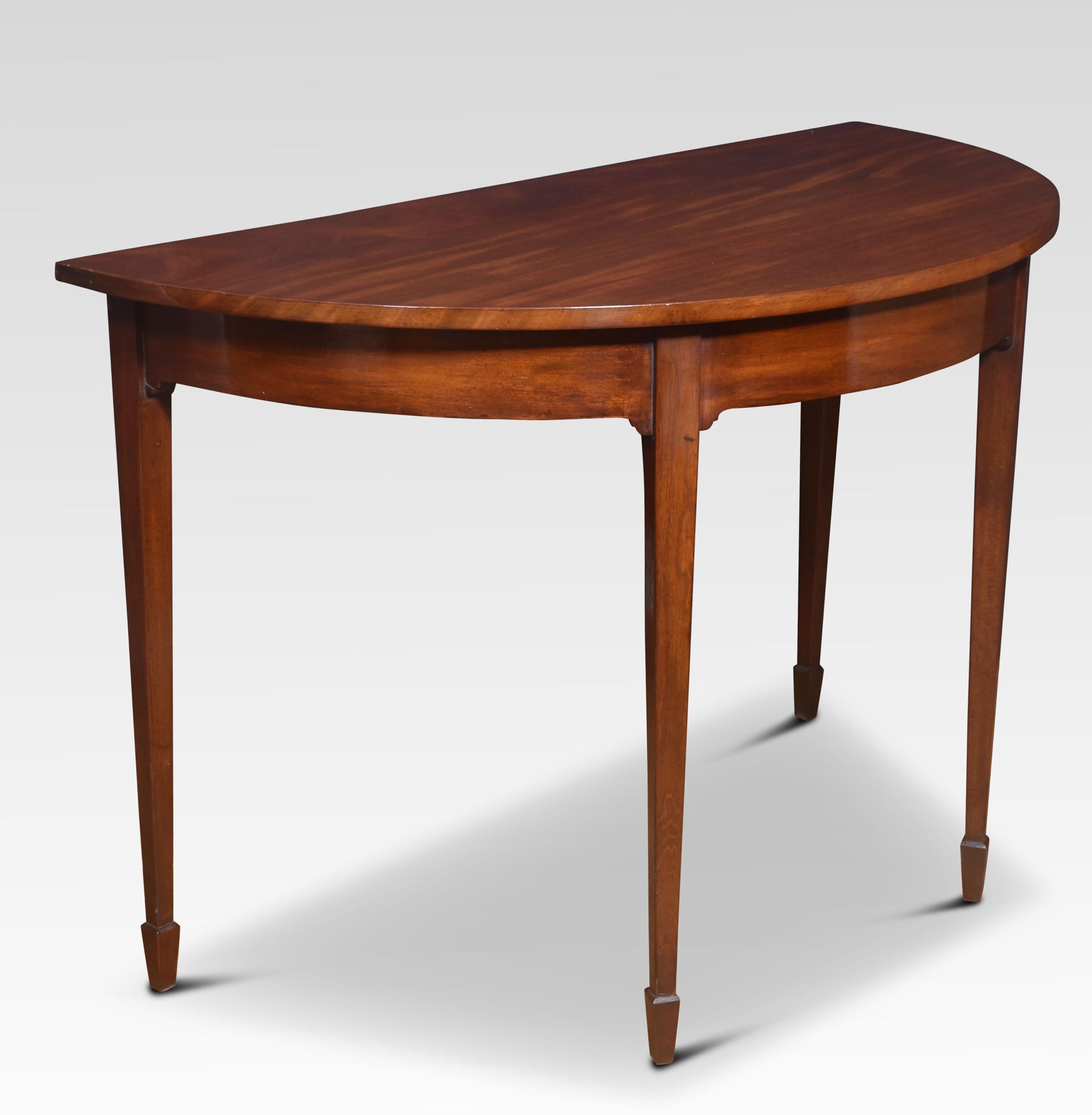 Pair of hall tables the well-figured half-round mahogany tops to the moulded freeze all raised on tapering legs, terminating in spade feet.
Dimensions
Height 31.5 Inches
Width 48.5 Inches
Depth 24 Inches
