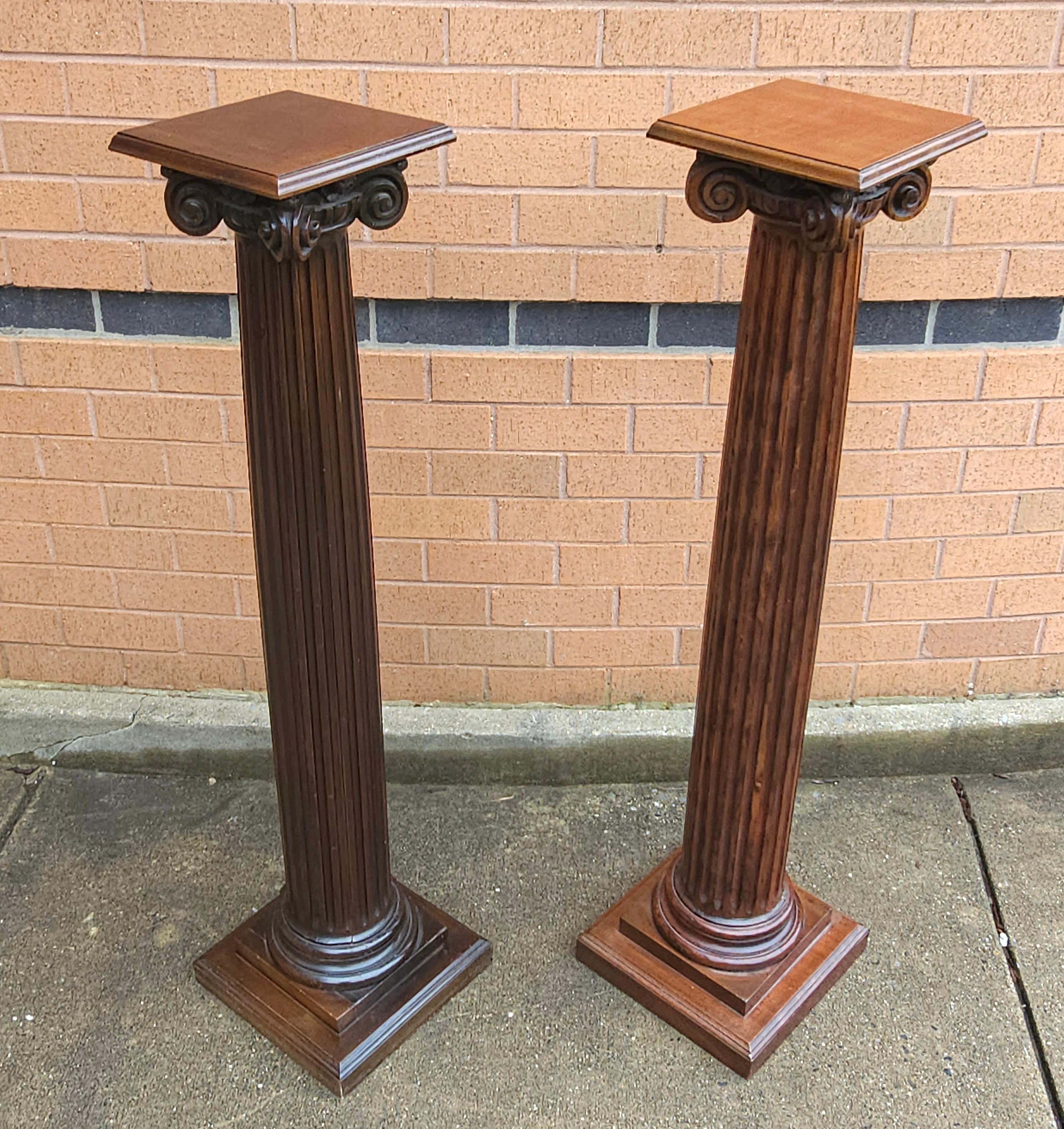 Carved Pair Of Mahogany Ionic Order Style Column-Form Pedestals For Sale