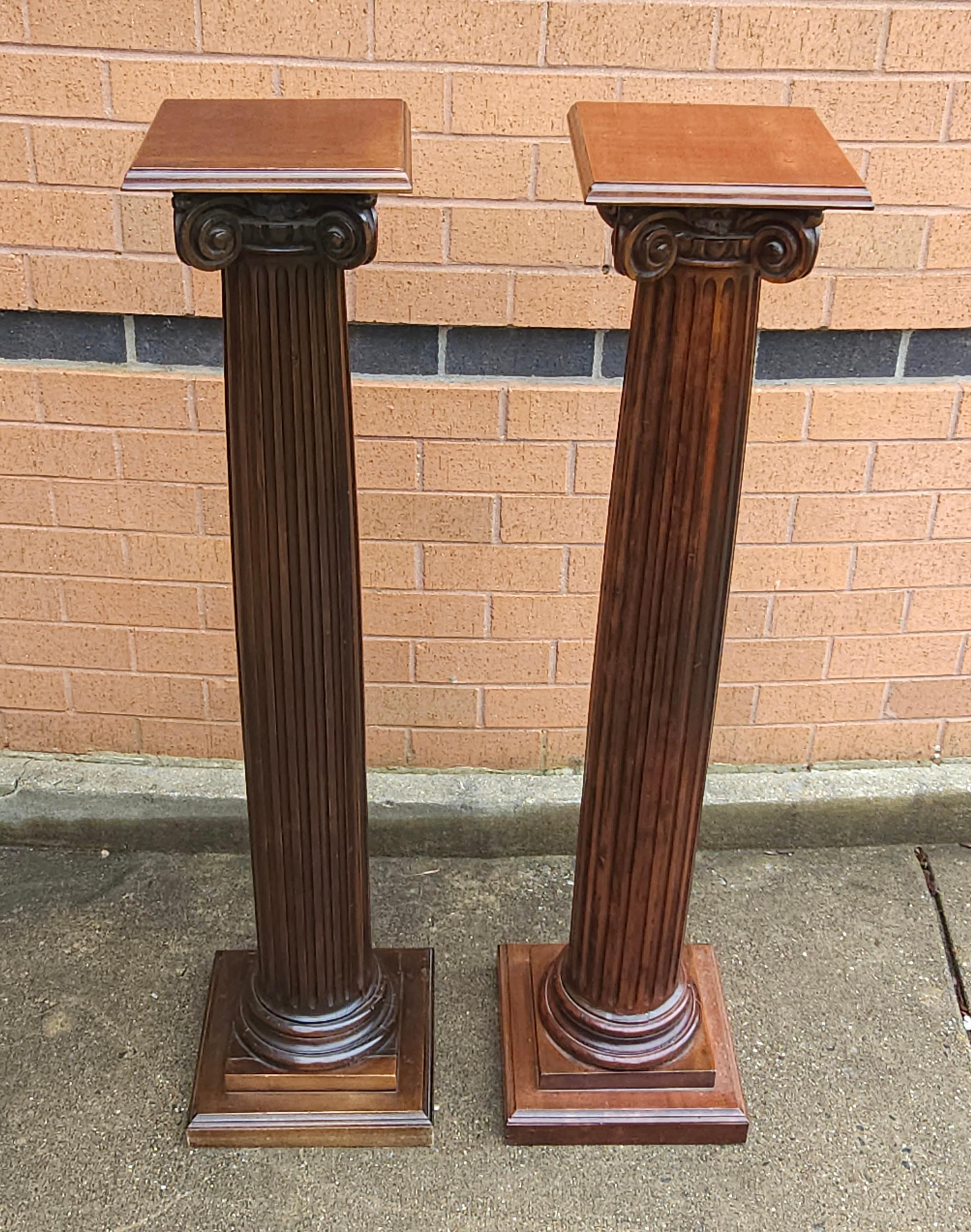 Pair Of Mahogany Ionic Order Style Column-Form Pedestals In Good Condition For Sale In Germantown, MD