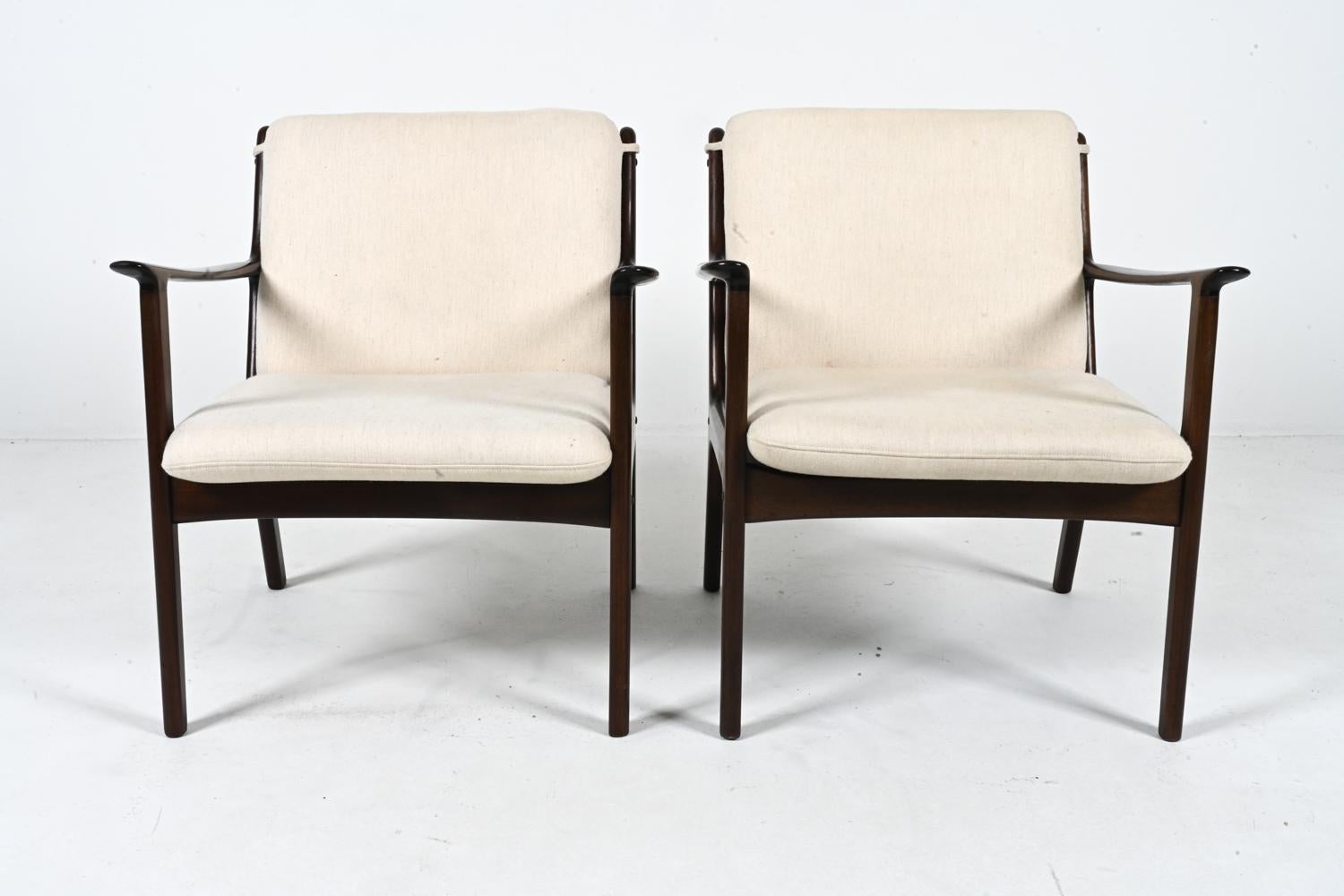 Mid-Century Modern Pair of Mahogany Lounge Chairs, Model PJ 112 by Ole Wanscher for Poul Jeppesen For Sale
