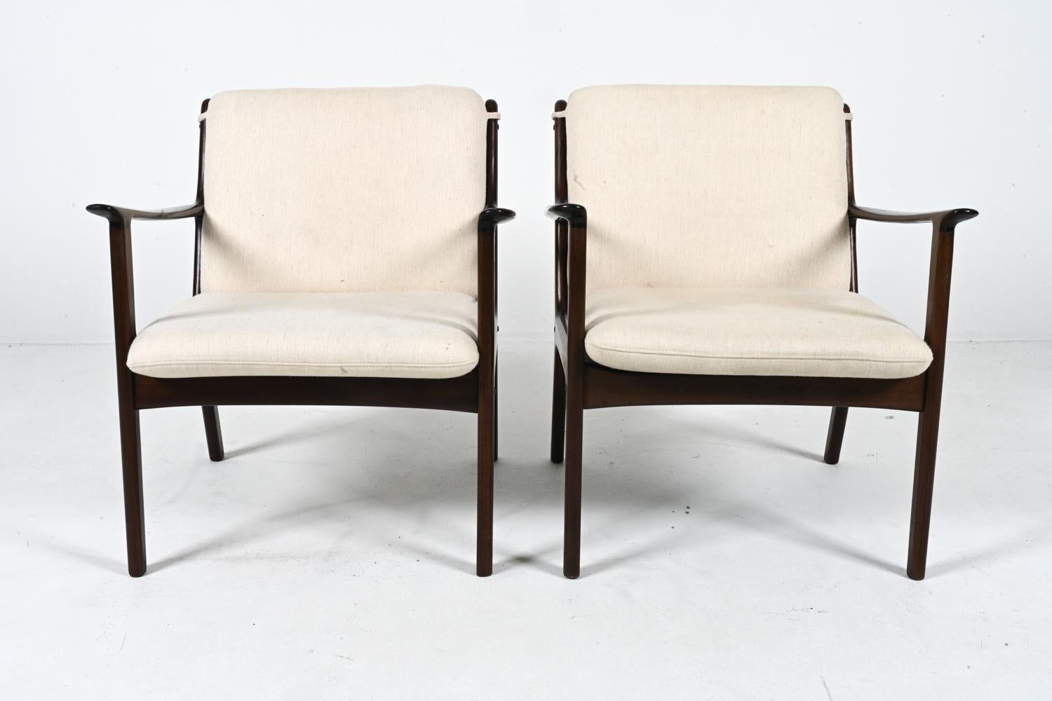 Mid-Century Modern Pair of Mahogany Lounge Chairs, Model PJ 112 by Ole Wanscher for Poul Jeppesen