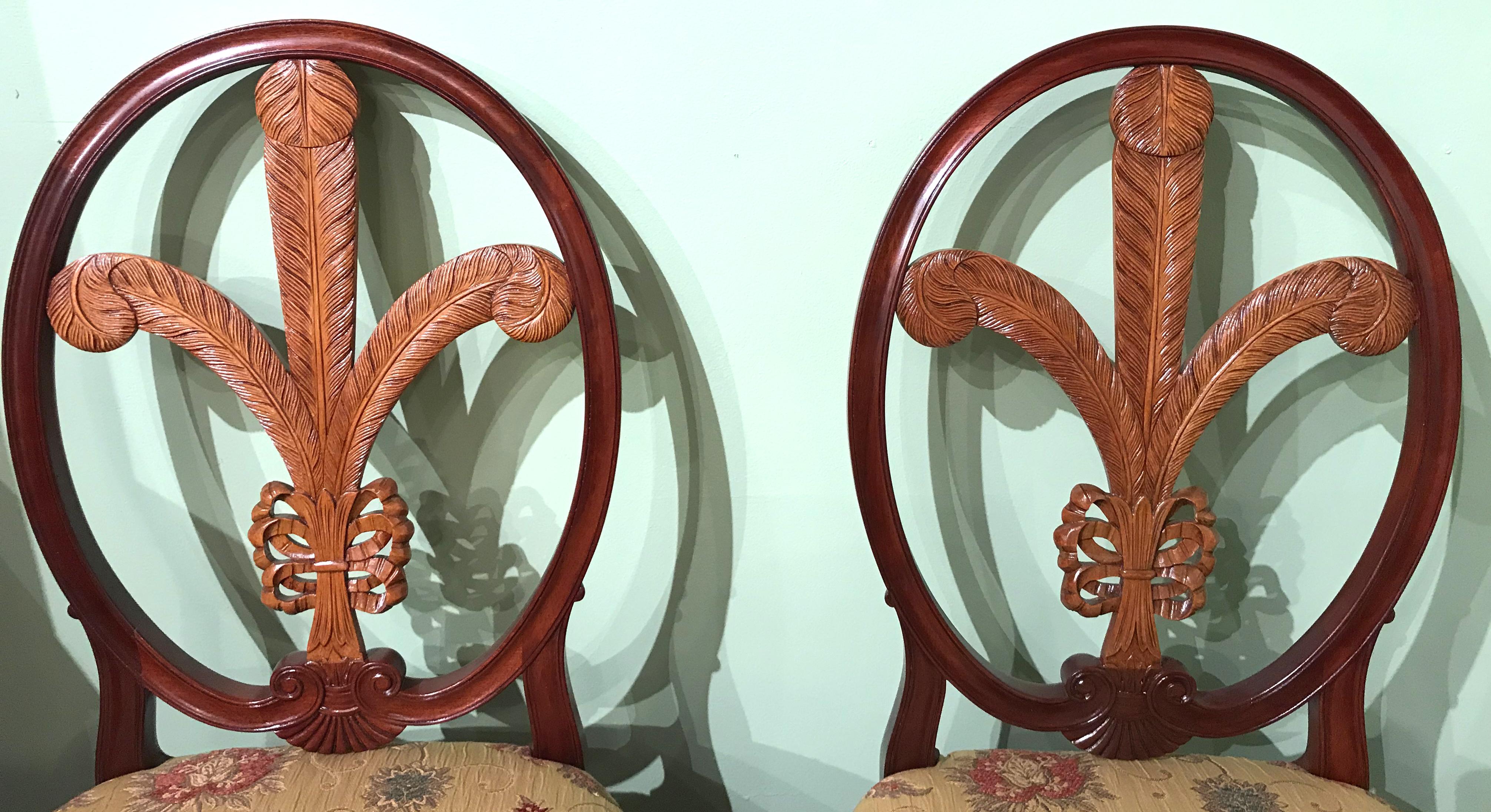 A beautiful pair of mahogany side chairs with maple carved Prince of Wales feather backs, finely reupholstered with complimenting foliate material. A quality set by Boston furniture maker Joseph Gerte, circa 1940s. Very good to excellent overall