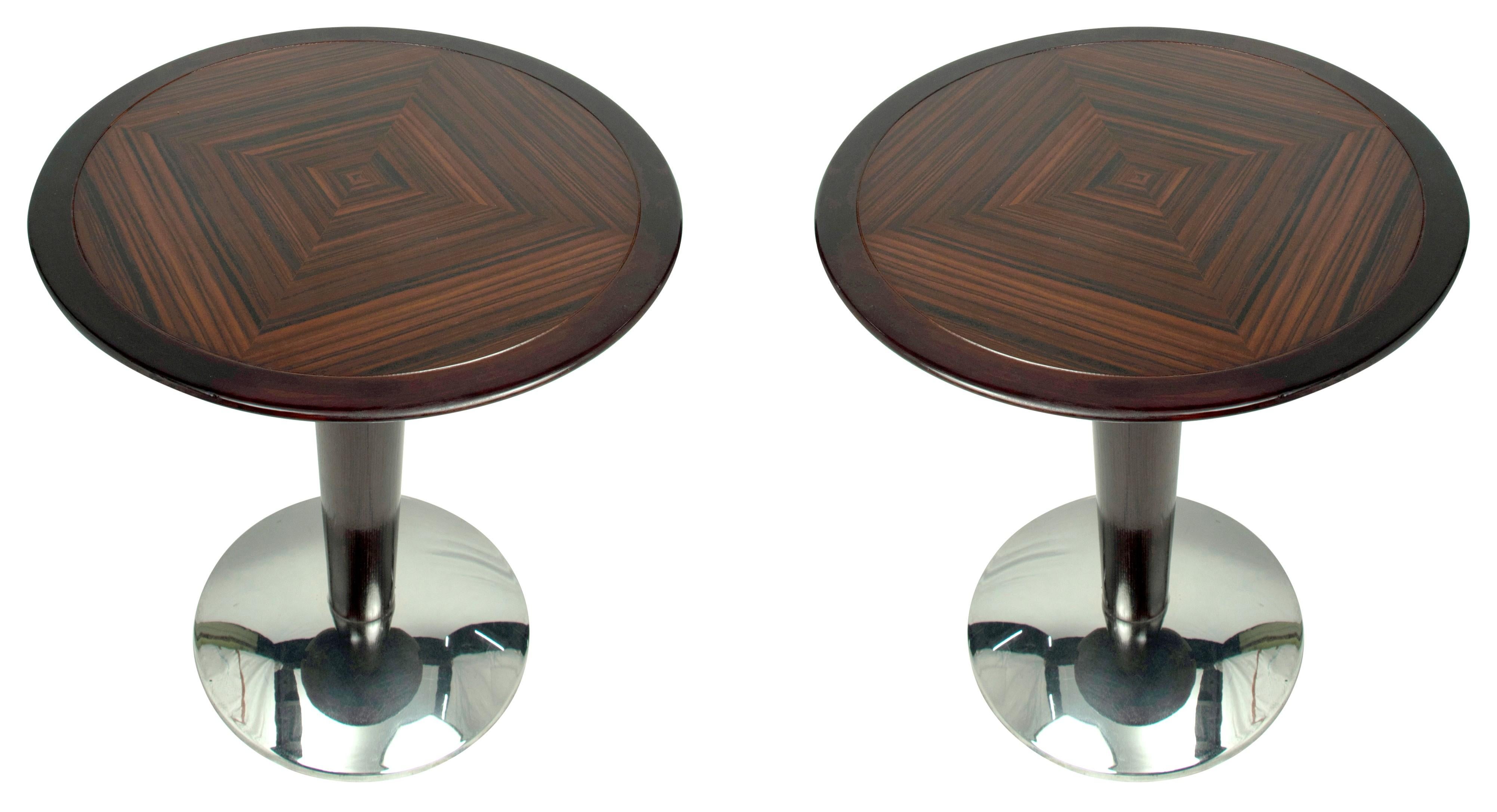 A pair of stunning side tables with a mahogany and rosewood marquetry herringbone design featured on the top.  The base is rosewood with a chrome base.  Date to the mid 1900's.  Sturdy, beautiful and substantial.

The Lockhart Collection is a