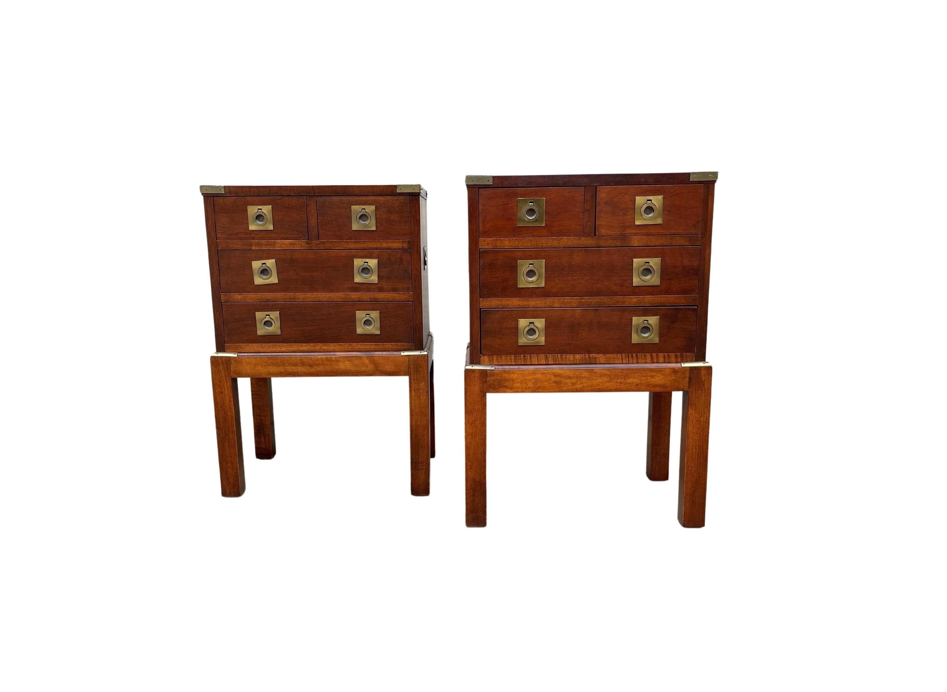 We are delighted to offer for sale this stunning pair of modern military campaign chests mounted on custom stands, circa 1970s. Incredible style, craftsmanship and attention to detail. Clean-lined campaign style silhouette, solid mahogany wood