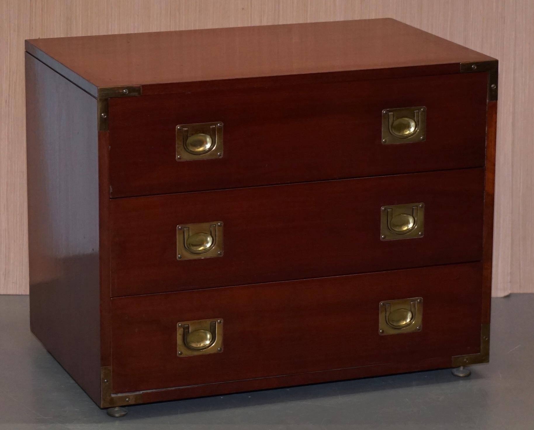 We are delighted to offer for sale this stunning pair of mahogany and brass military campaign style chests of drawers

A lovely pair, as you can see they are different sizes, they are made of a mixture of Mahogany and soft wood, the panels are