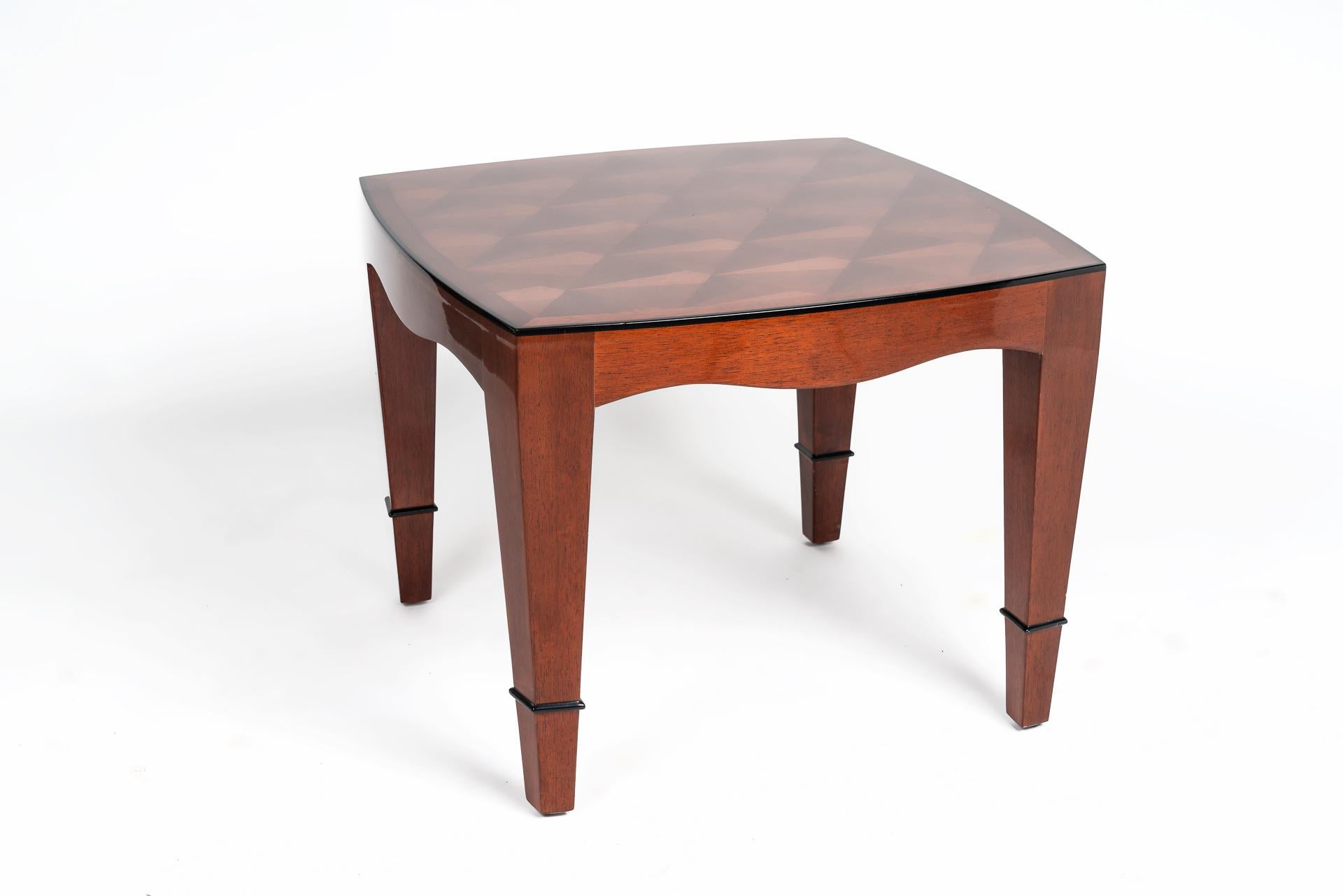 This beautiful pair of side tables shows the great art of inatsia work. The side tables are made of mahogany wood and on the table surface the inlay work is found in a fan-shaped form. The design of the table is rounded off by black details on the