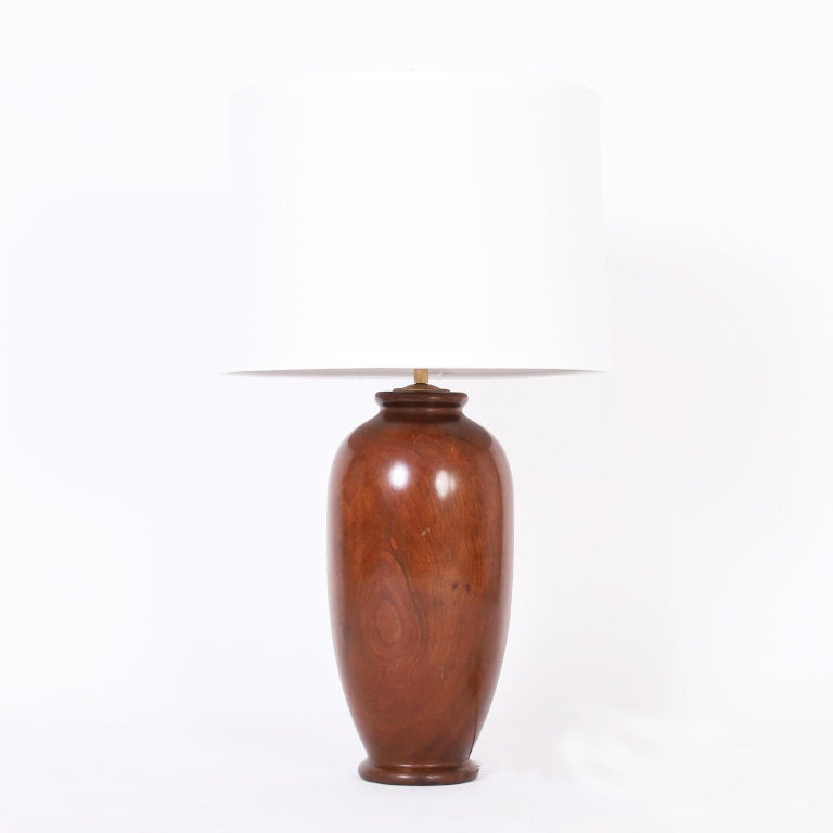 Less is more as is with this impressive pair of table lamps, turned from a block of mahogany into these perfectly simple, elegant works of decorative art.