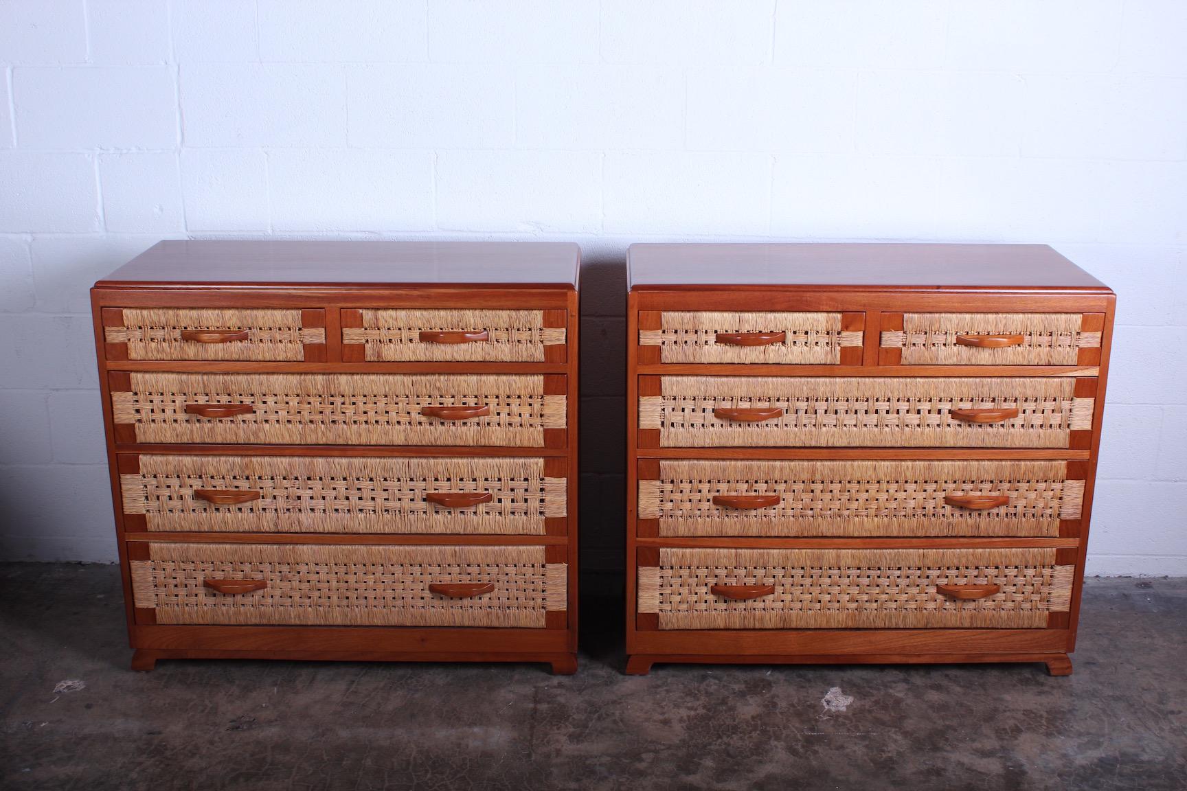 A pair of mahogany dressers with woven drawer fronts. Made in Mexico.