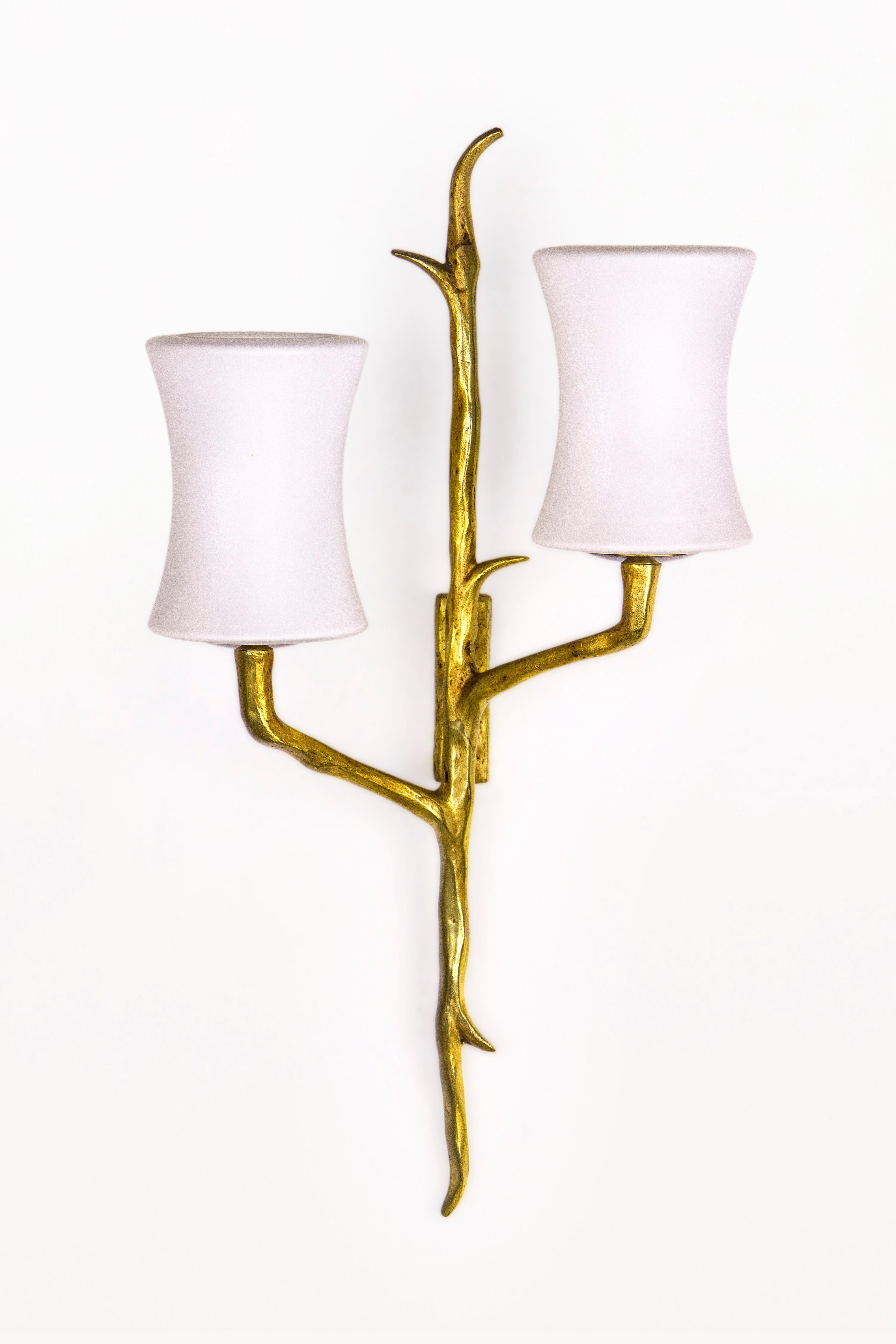 Pair of Maison Arlus sconces,
Very interesting and sculptural model in the style of Felix Agostini.
Bronze and opaline glass,
circa 1960, France.
Very good vintage condition.
 