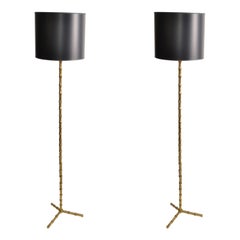 Coppia di lampade da terra Maison Baguès in bronzo finto bambù, stile metà del secolo scorso.
