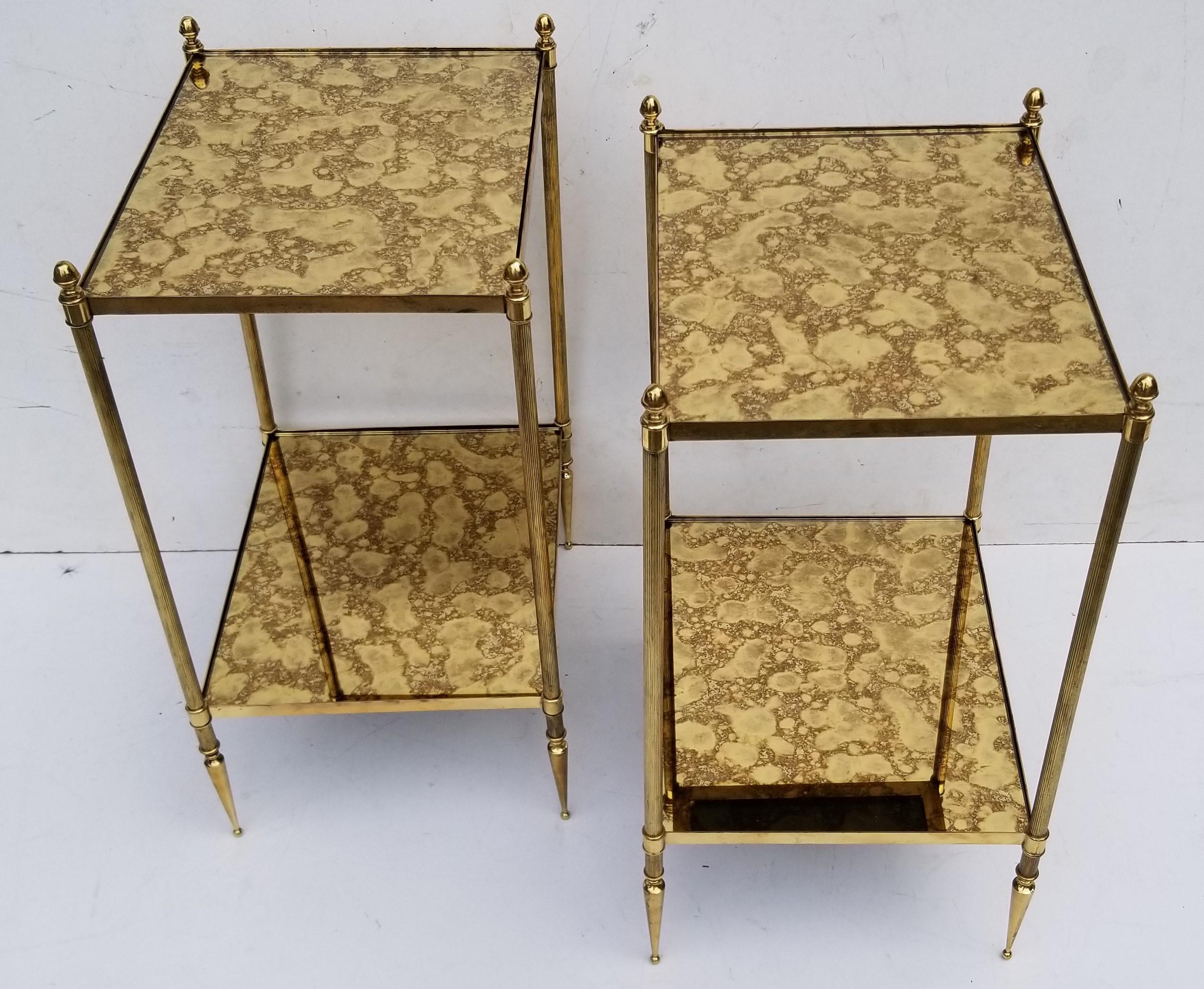 Pair of Maison Baguès French neoclassical side tables.
2-tier brass, bronze and gold cloudy mirrors.
     