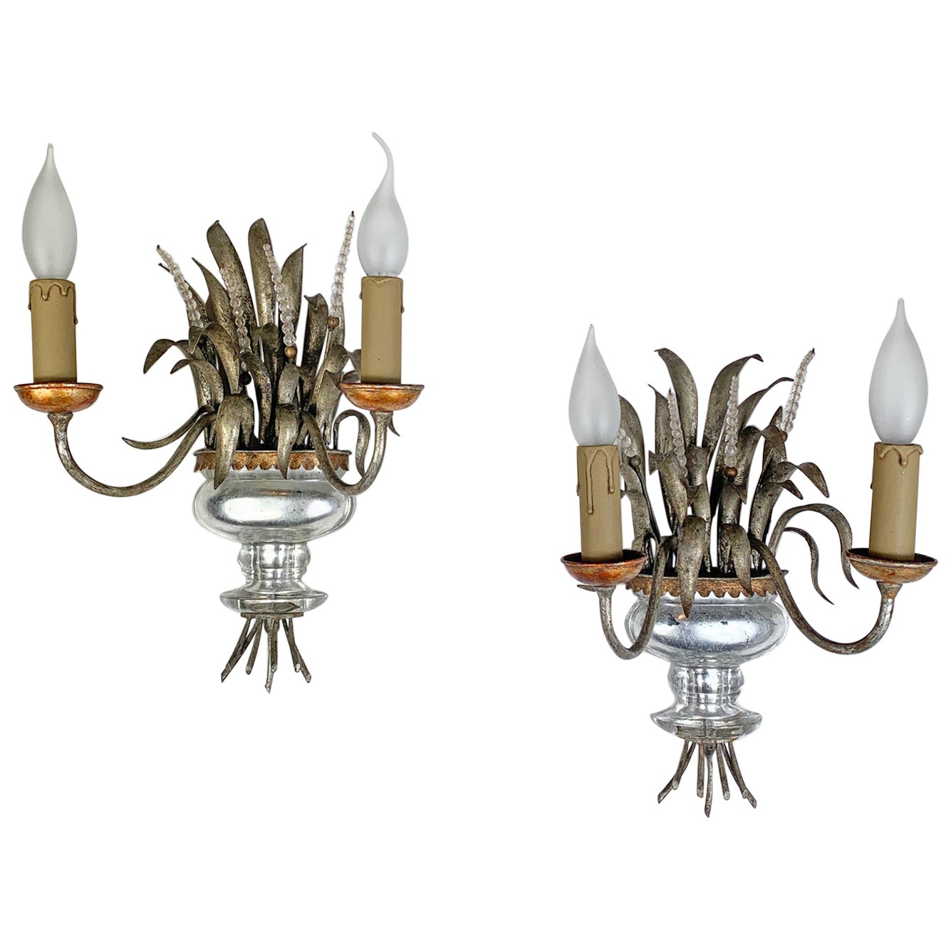 Paire d'appliques en cristal doré et argent de la Maison Bagues