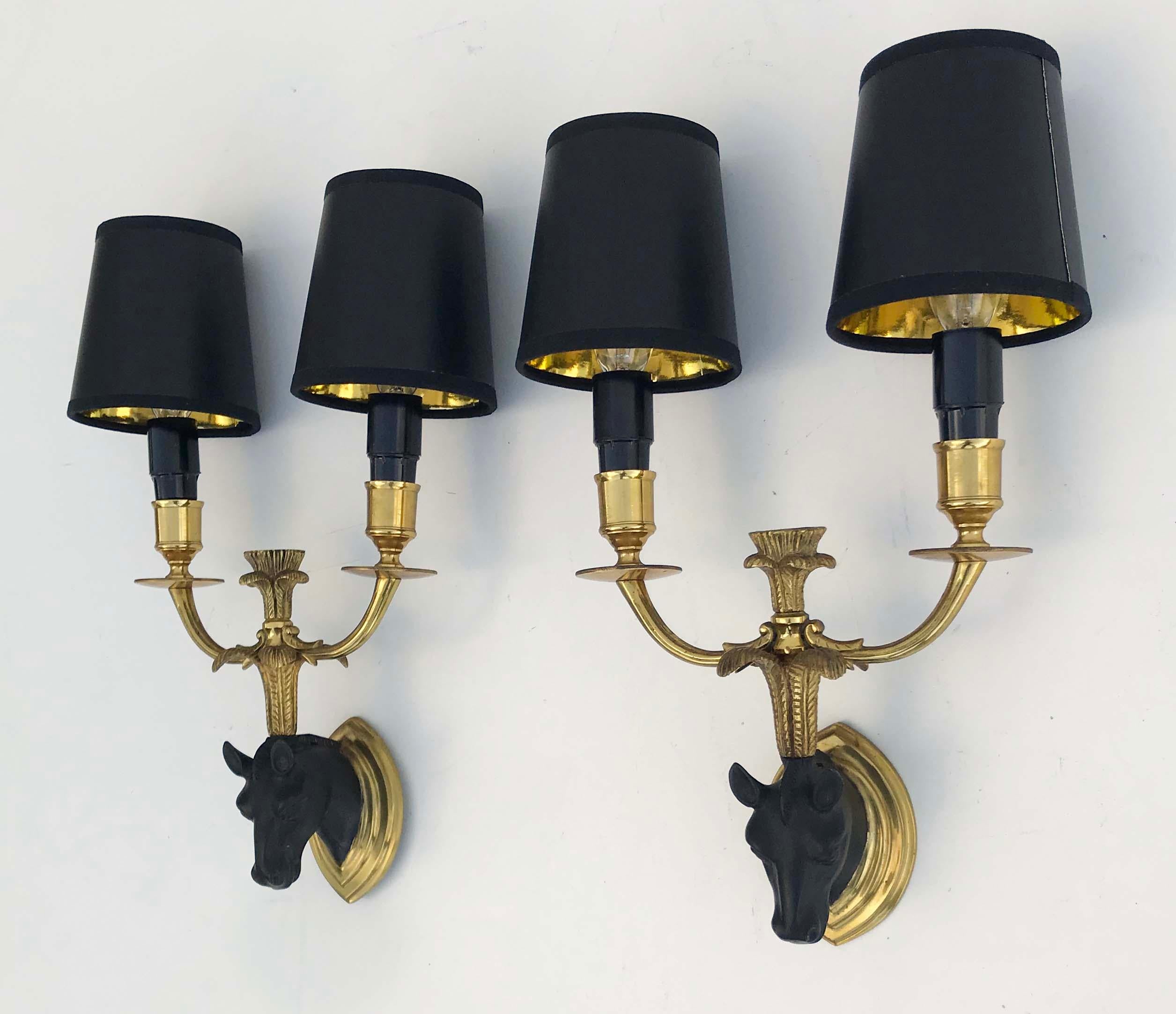 Superb pair of Maison Baguès “ Horse “ sconces
2 lights, 40 watts max bulb per light 
US Rewired and in working condition 
Custom backplate available.

Measures: Back plate: 4