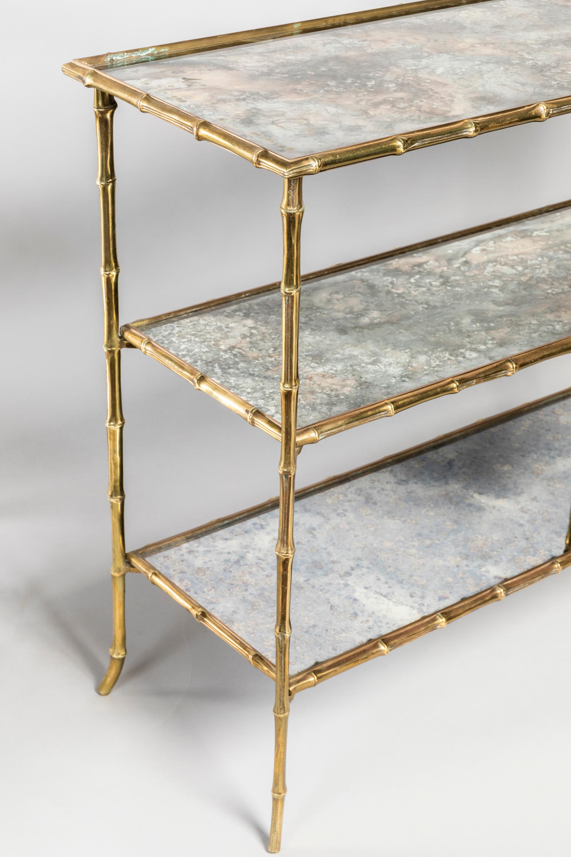 These two rectangular Maison Baguès side tables are made with mercure work glasses and bambou brass feet (Baguès signature shape). Neoclassical and sophisticated design.
 