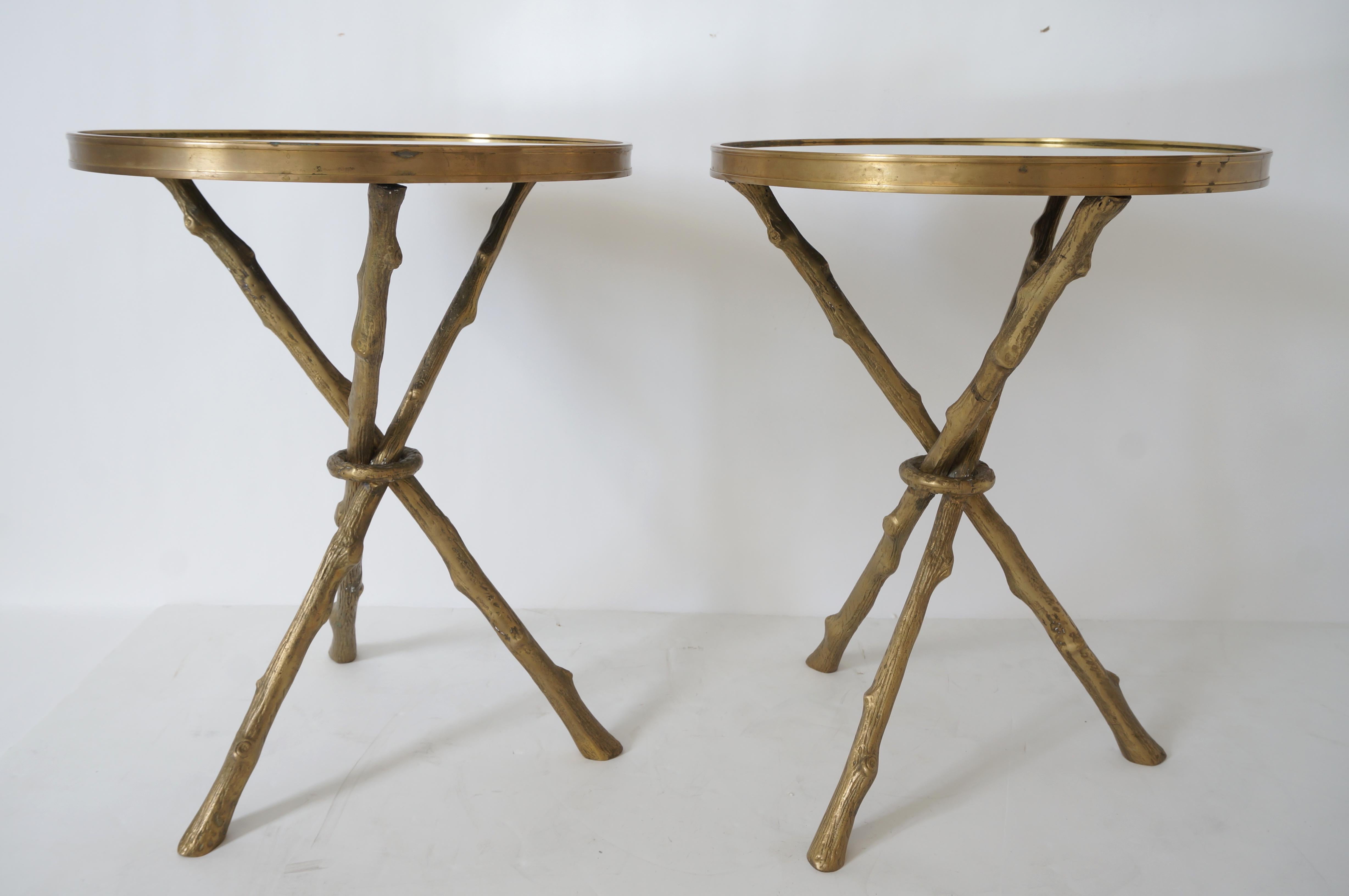 This stylish pair of brass faux bois side tables with mirror tops are very much in the manner of pieces created by Maison Bagues.