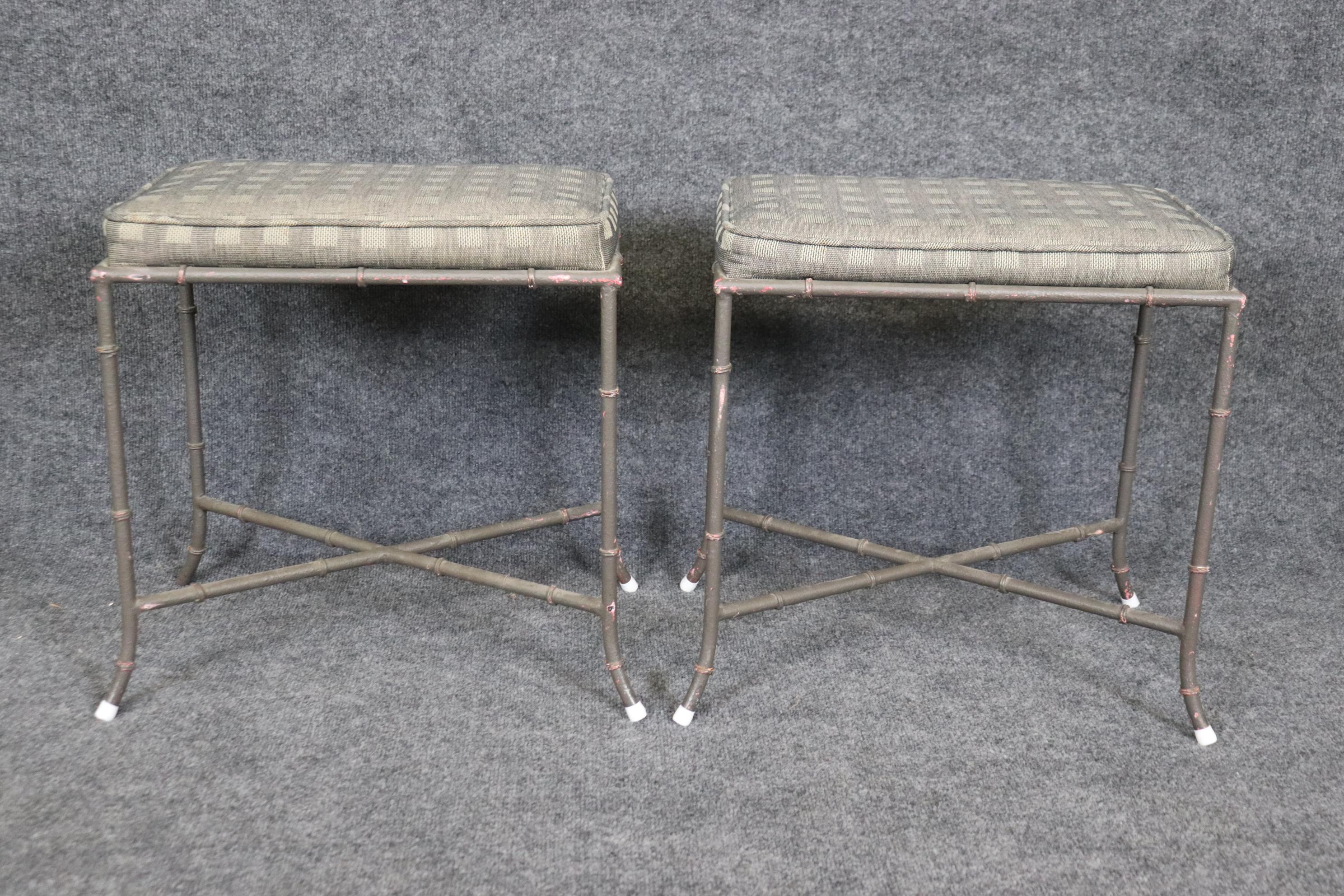 Nice pair of metal faux bamboo Maison Bagues style rectangular benches. The benches have plastic white toe caps to protect the floor. We can see one is missing. They are in good vintage condition. Measures 19 tall x 18 wide x 12 deep and dates to