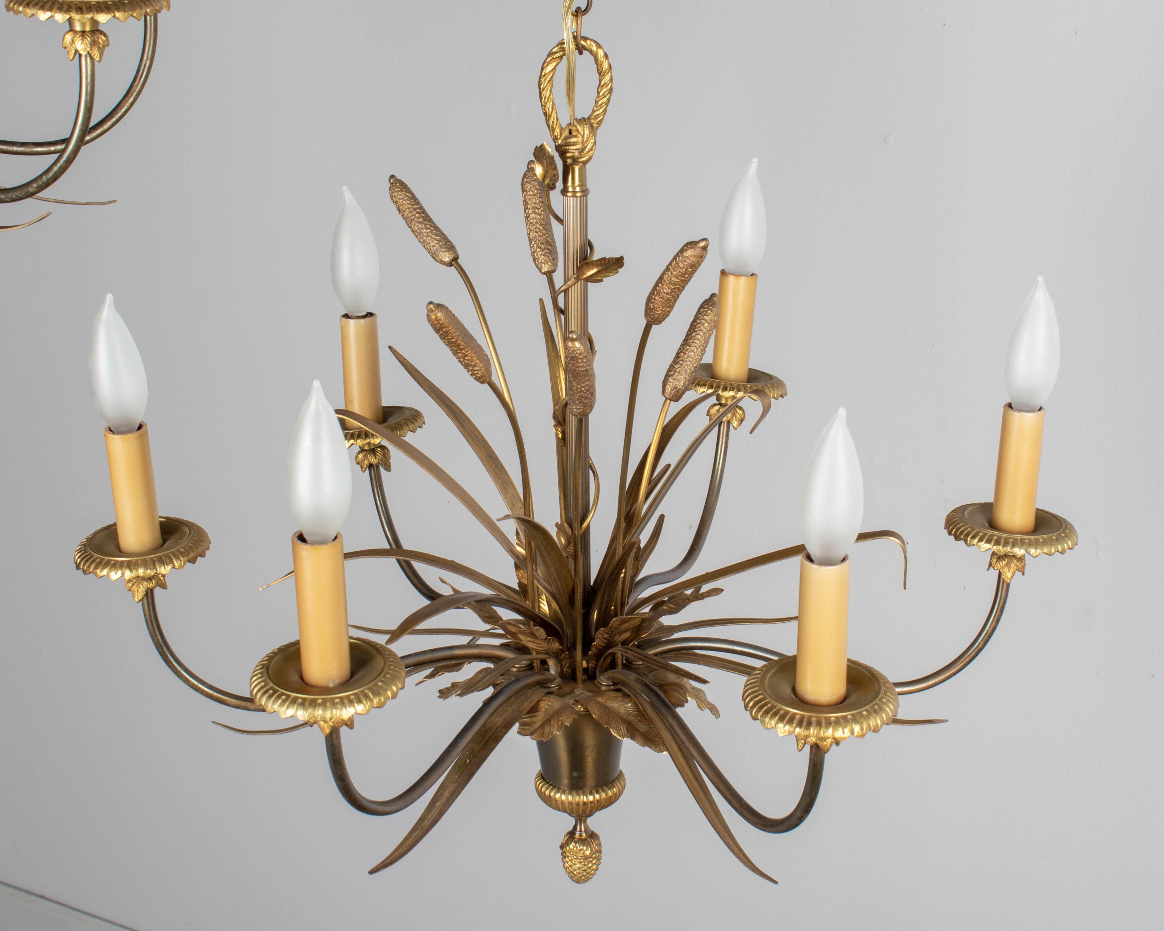 Pair of Maison Charles Bronze Chandeliers In Good Condition In Winter Park, FL