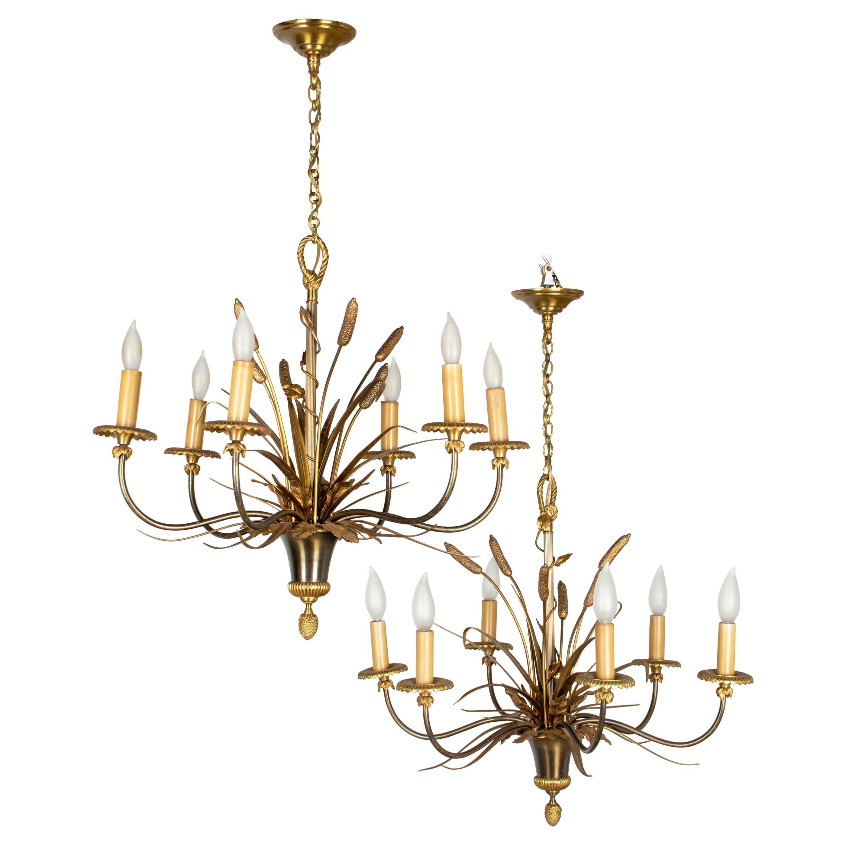 Pair of Maison Charles Bronze Chandeliers