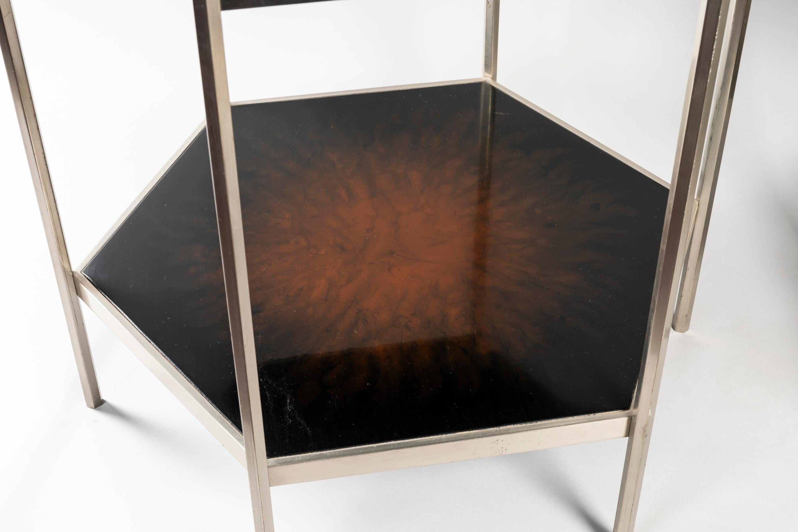 Chic modern black lacquered coffee table (touch of red: flamed) designed by Jacques Charles in the 1970s for prestigious Maison Charles in Paris. All structure is made in brushed steel.