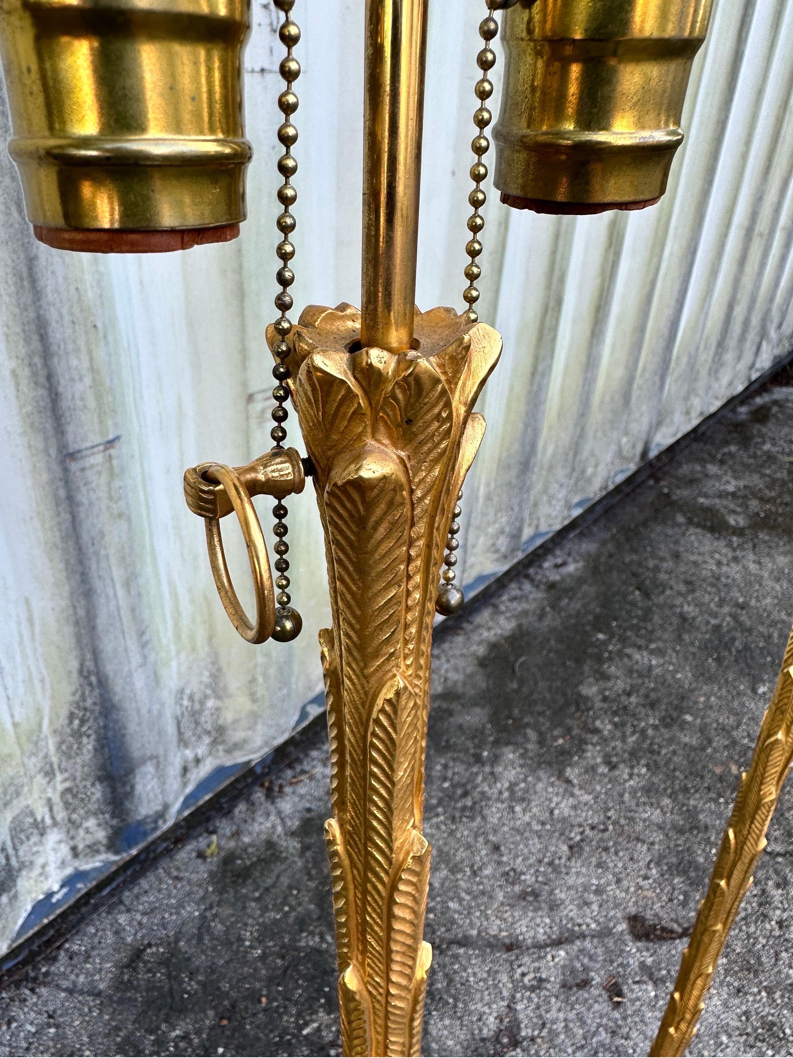 Paire de lampadaires en bronze doré de la Maison Charles 
Superbe qualité, forme de palmier.
Estampillé sur la base .
Nouveau câblage américain.