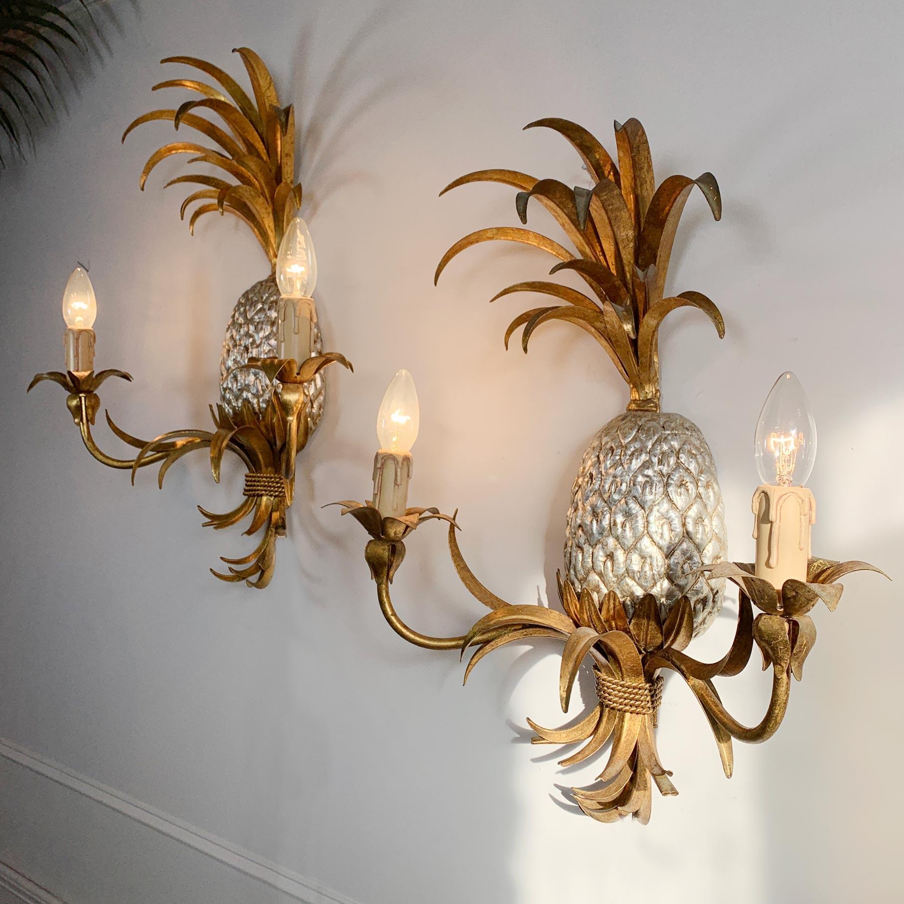 Superb pair of gilt and silver Maison Charles attributed wall lights, dating to the 1950's they are in the form of Pineapples, with large gold leaf fronds to the top and base, the two arms extend out, each housing a single e14 (small screw in)