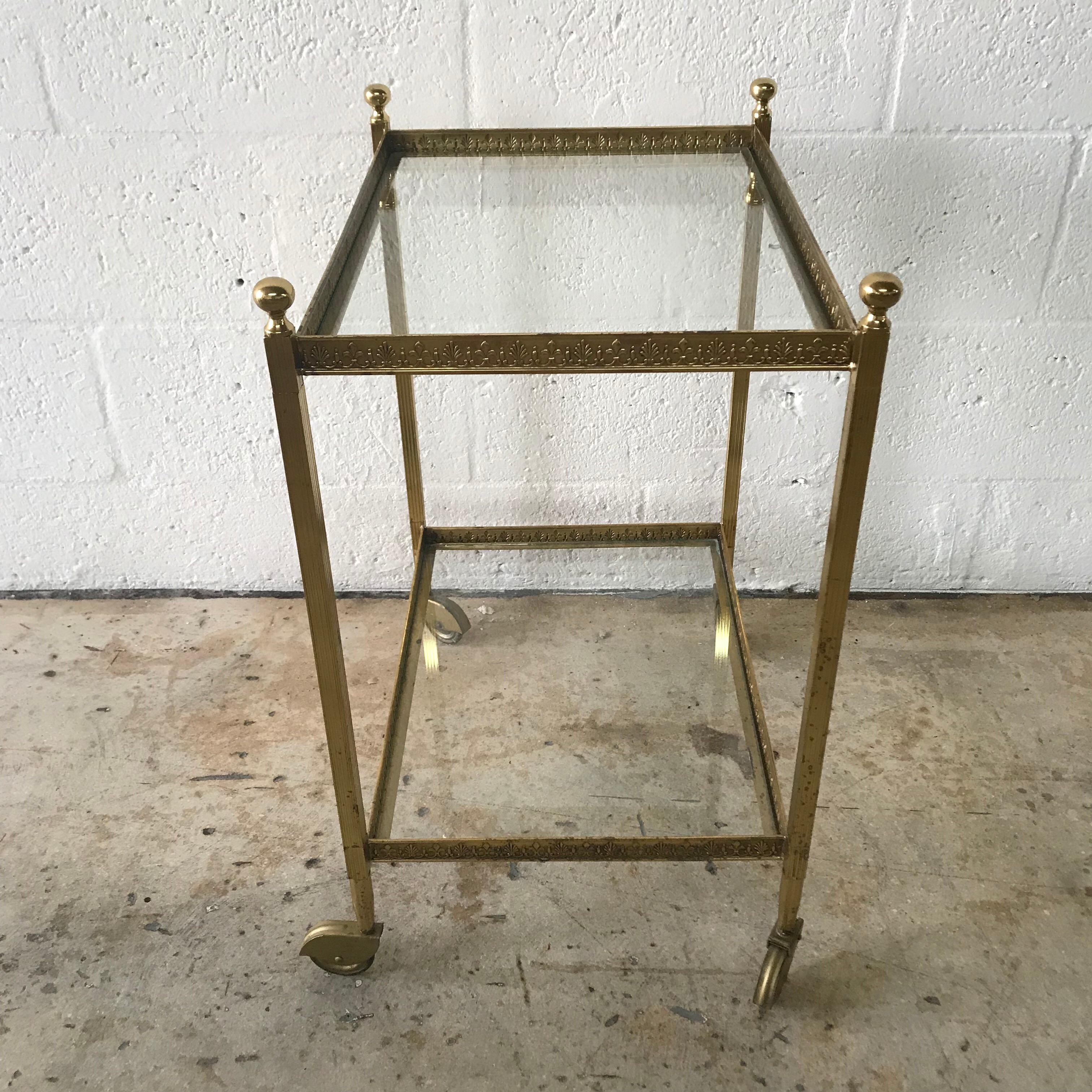 Pair of Maison Jansen Brass and Glass Two-Tier Rolling Occasional Tables or Cart (Moderne der Mitte des Jahrhunderts)