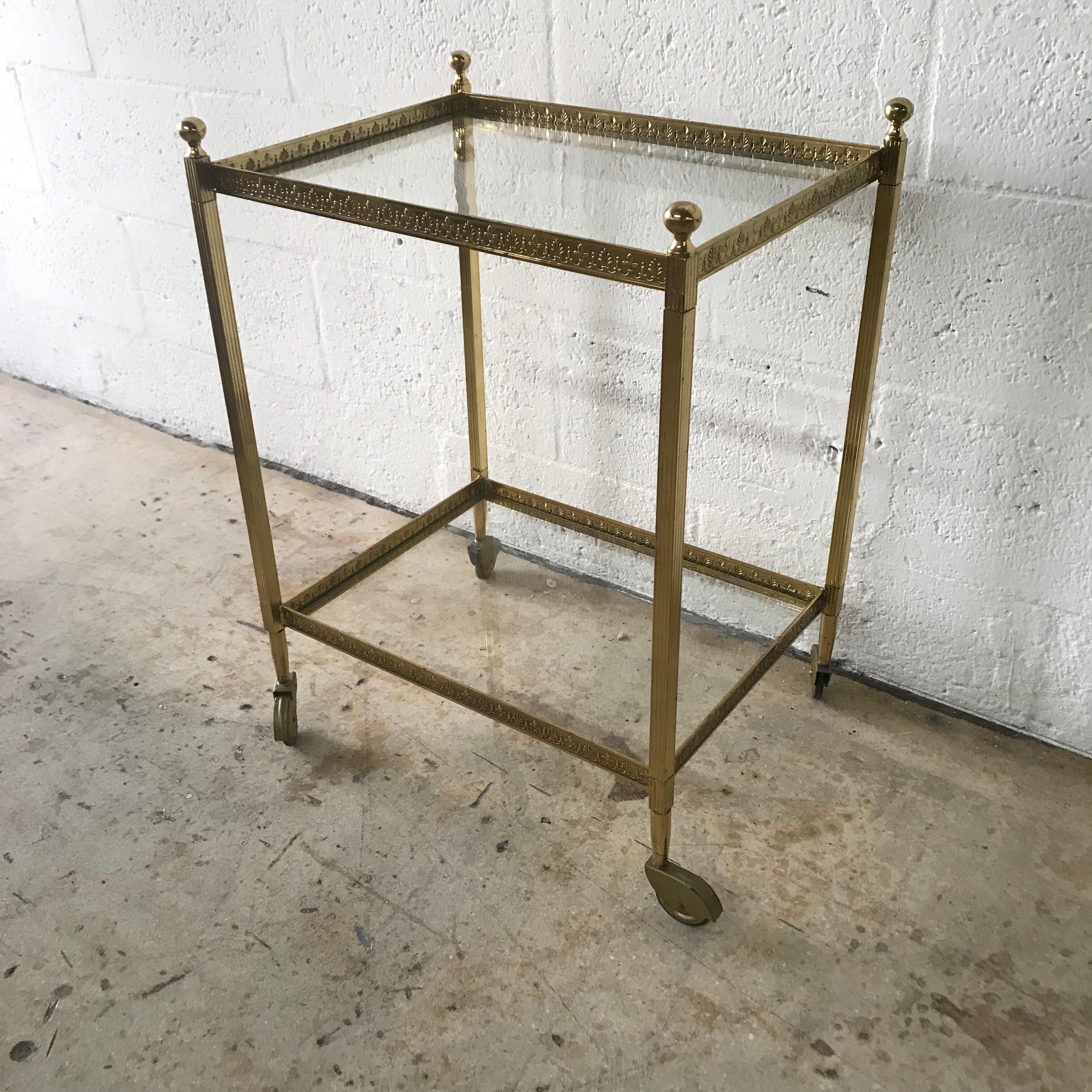 Pair of Maison Jansen Brass and Glass Two-Tier Rolling Occasional Tables or Cart im Zustand „Gut“ in Miami, FL
