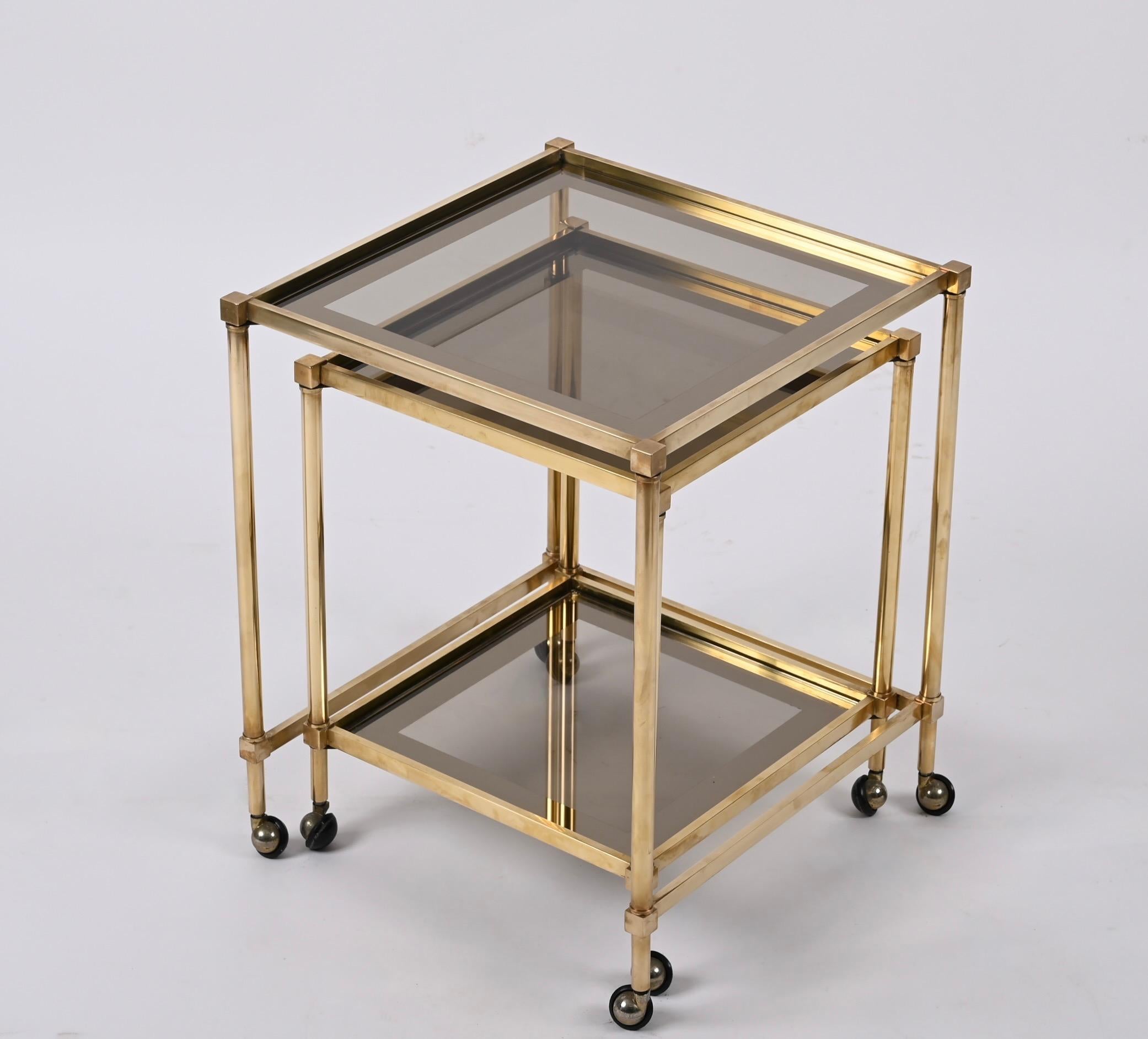 Pair of Jansen Style Brass Mirrored Border Nesting Tables with Glass Top, 1970s For Sale 4
