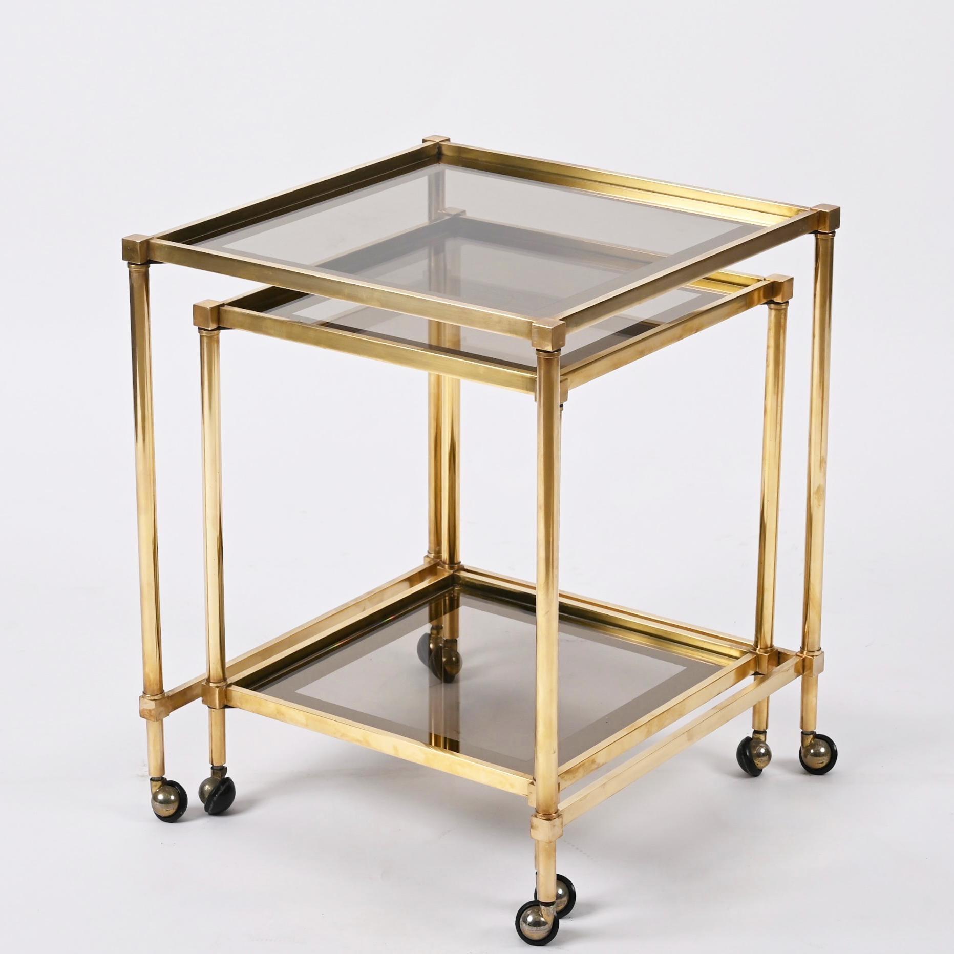 Pair of Jansen Style Brass Mirrored Border Nesting Tables with Glass Top, 1970s For Sale 8