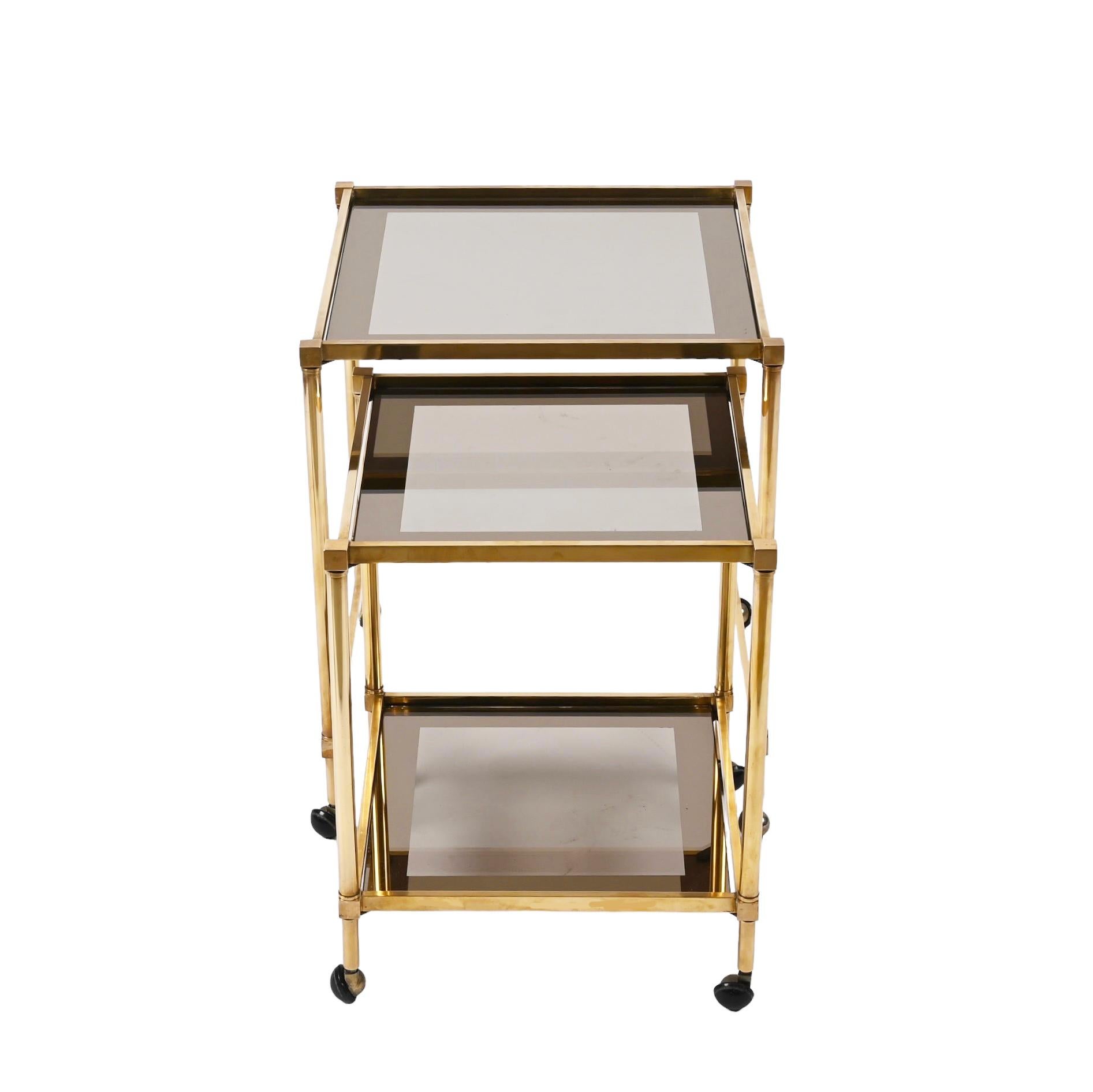 Pair of Maison Jansen Brass Mirrored Border Nesting Tables with Glass Top, 1970s For Sale 1