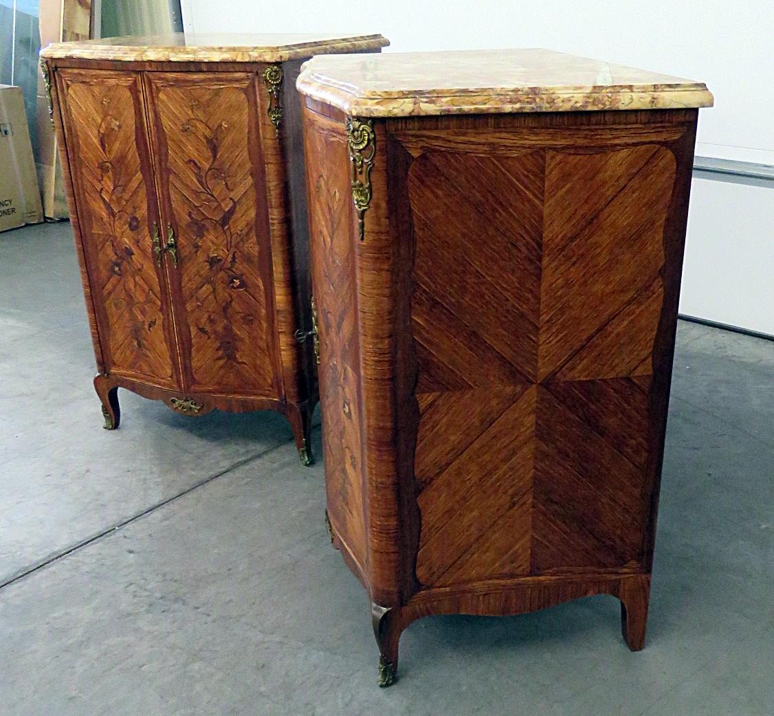 Pair of Maison Jansen inlaid marble-top commodes with bronze mounts. Stamped 
