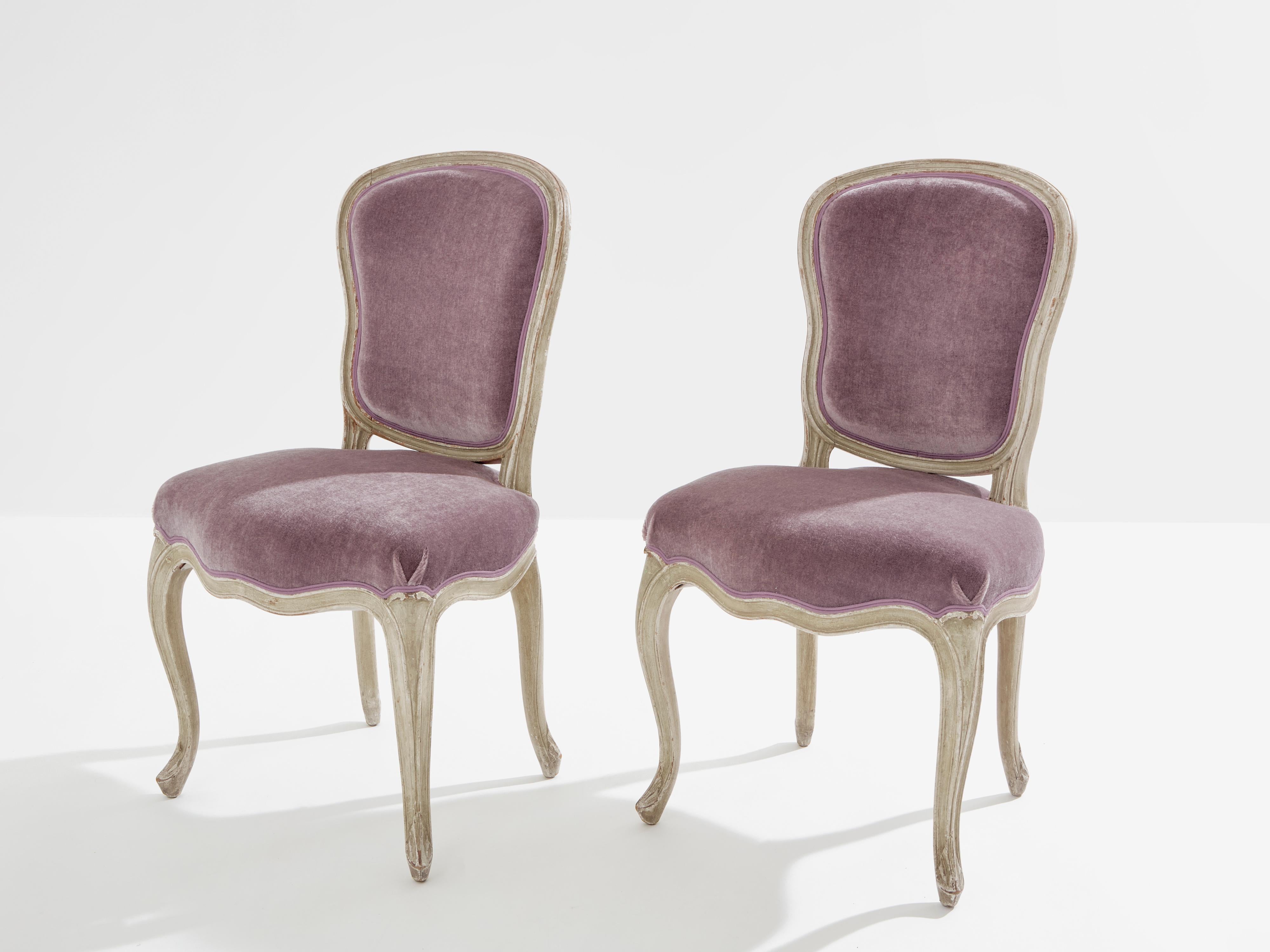 The craftsmanship of this pair of slipper chairs was deeply cared about, and it really shows some eight decades later. The side chairs were made and stamped by Maison Jansen in the early 1940s in their pure Neoclassical Louis XV inspired style. The