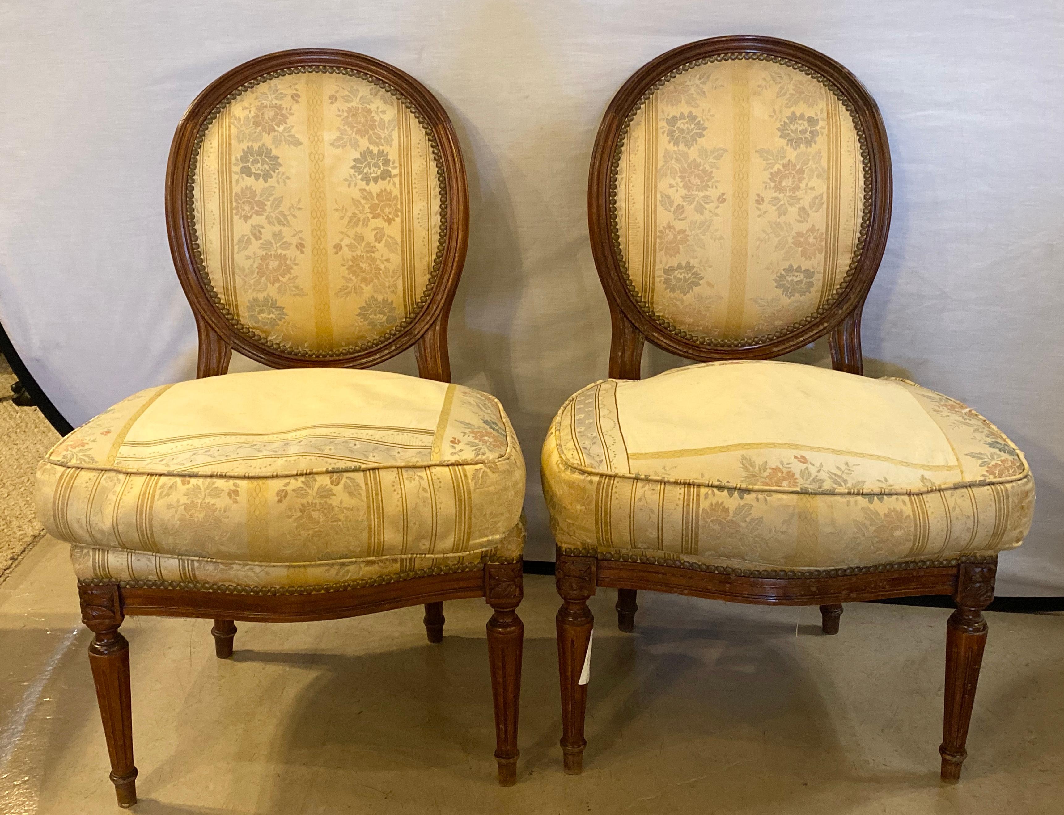 Fabulous pair of Louis XVI boudoir chairs, slipper chairs. Stamped Jansen, original upholstery which needs to be changed. 