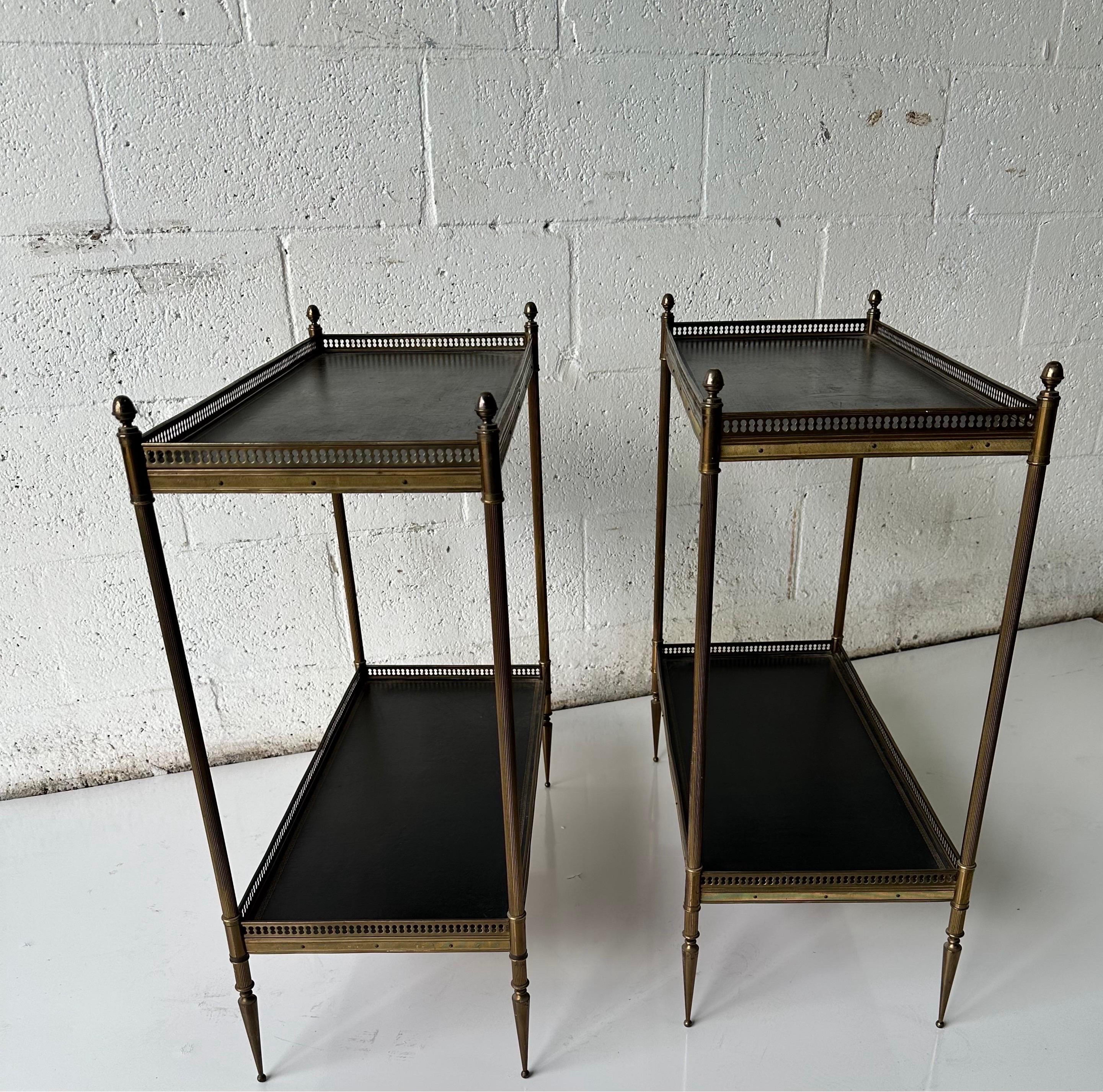 Pair of Maison Jansen Brass and leather side table .