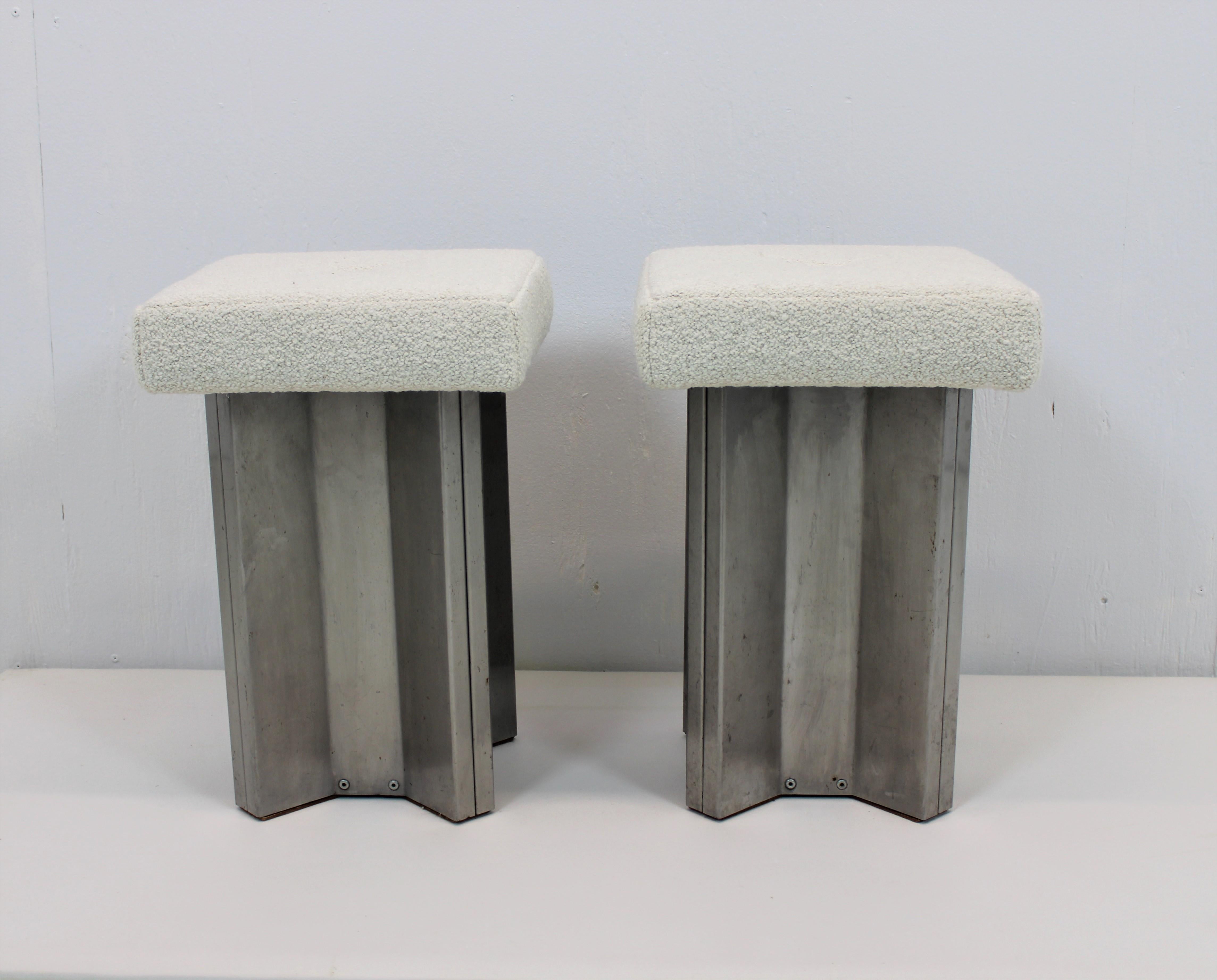 Cruciform stainless steel stools in Roger & Goffigon bouclé fabric.
  