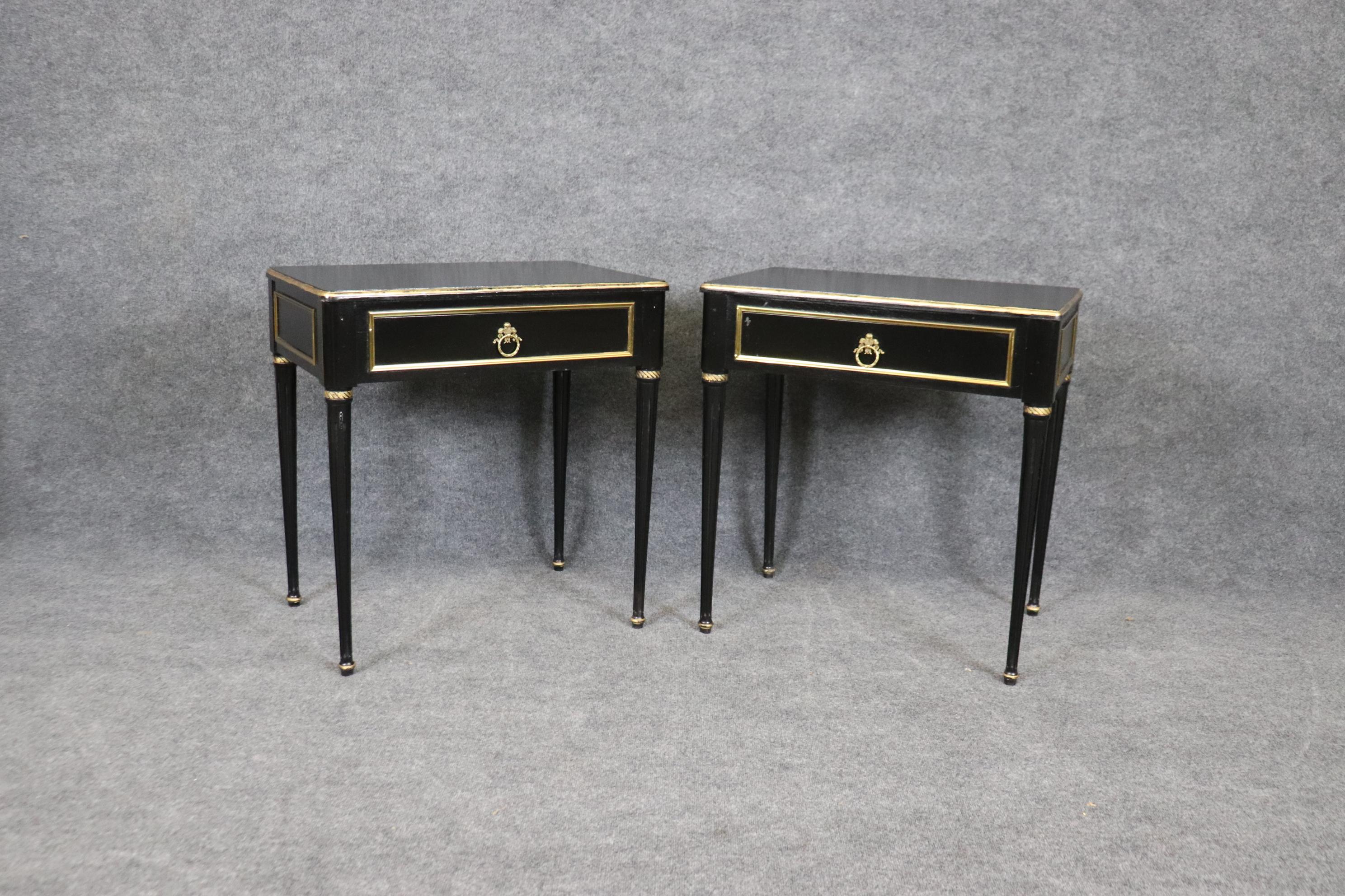Mid-20th Century Pair of Maison Jansen Style Ebonized Gilded Brass Trimmed End Tables