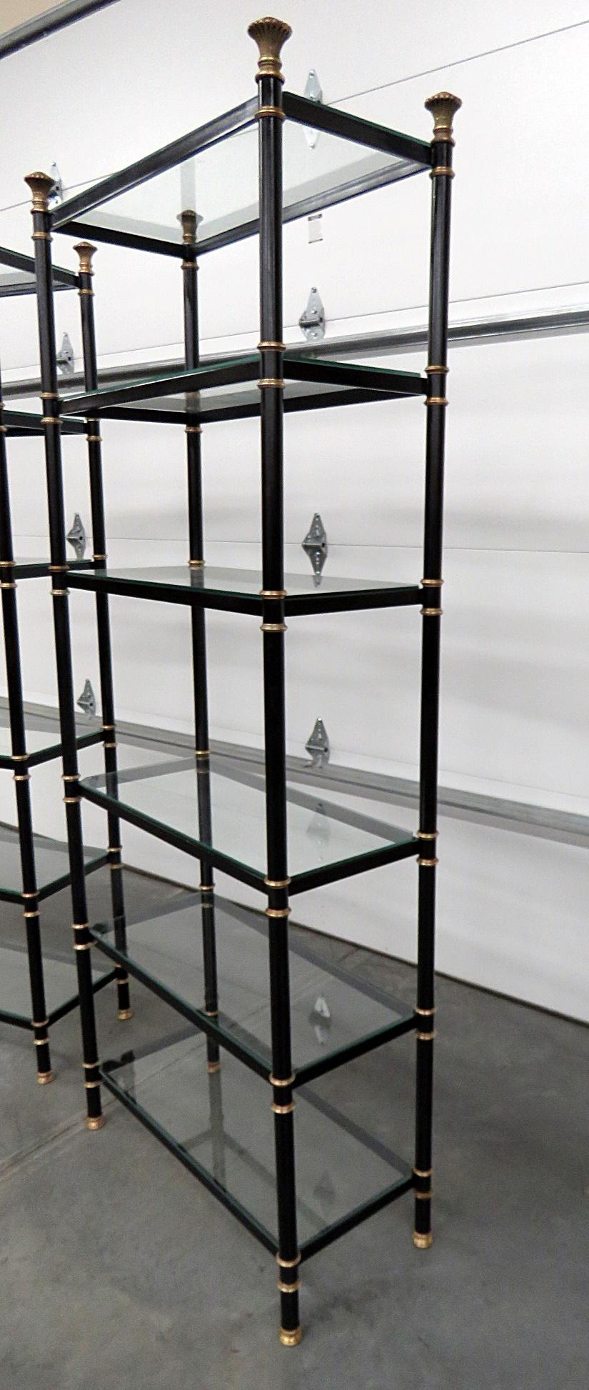 Pair of Maison Jansen style étagères with 6 glass shelves.