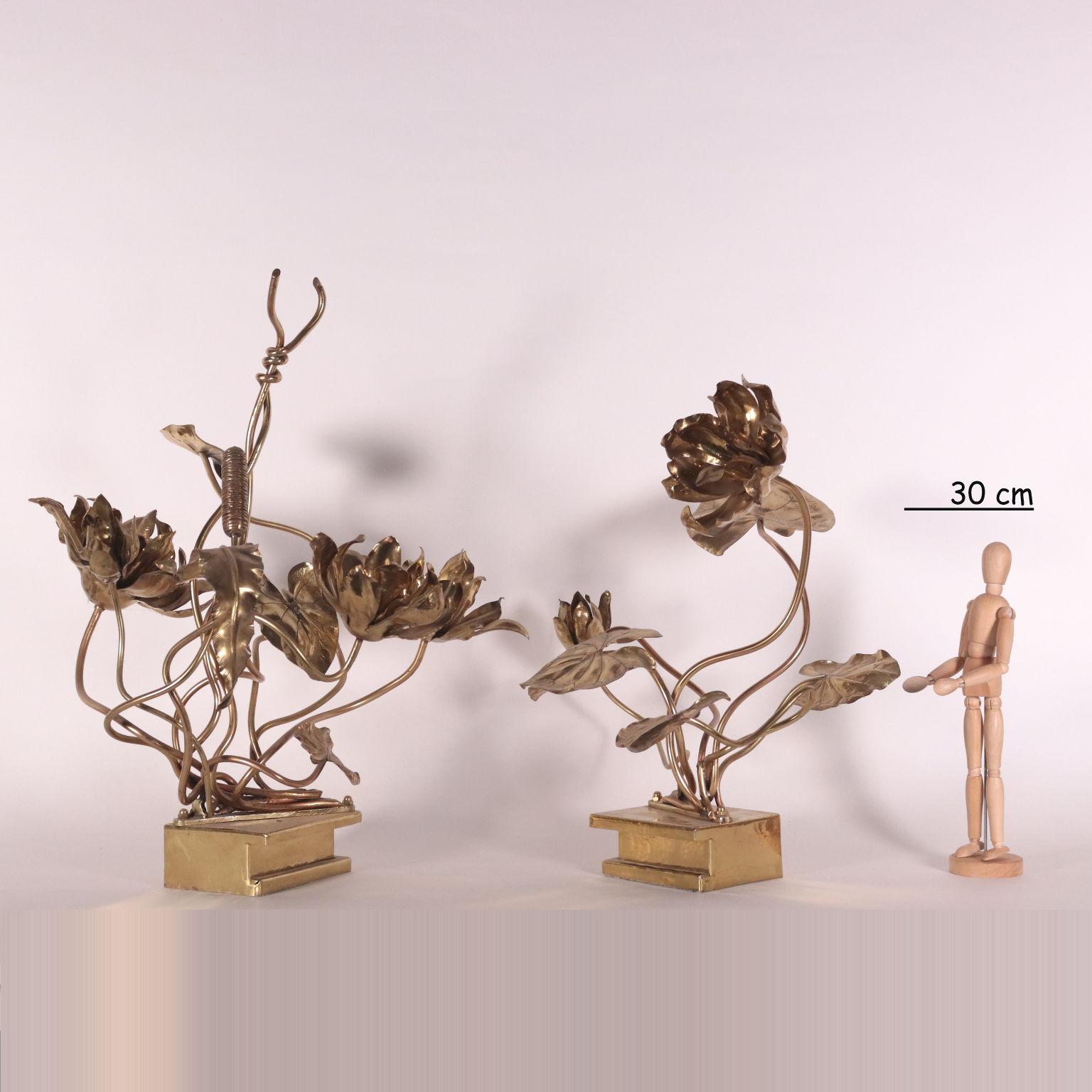 Pair of brass sculptures with flowers and leaves. In the manner of Maison Jansen.