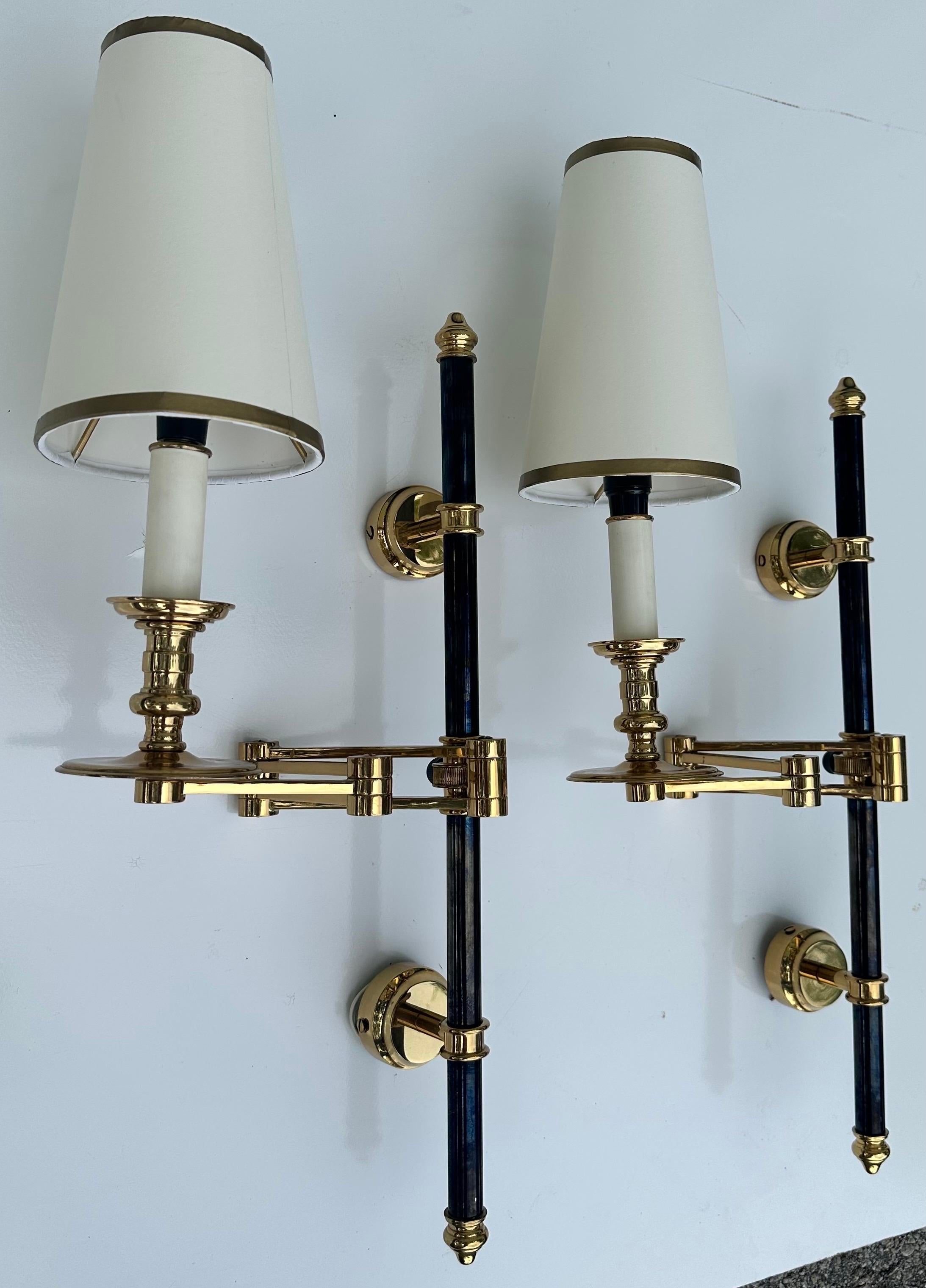 Superb pair of Maison Jansen retractable sconces,
US rewired and in working condition
Measures:
Back plate 2.3/8