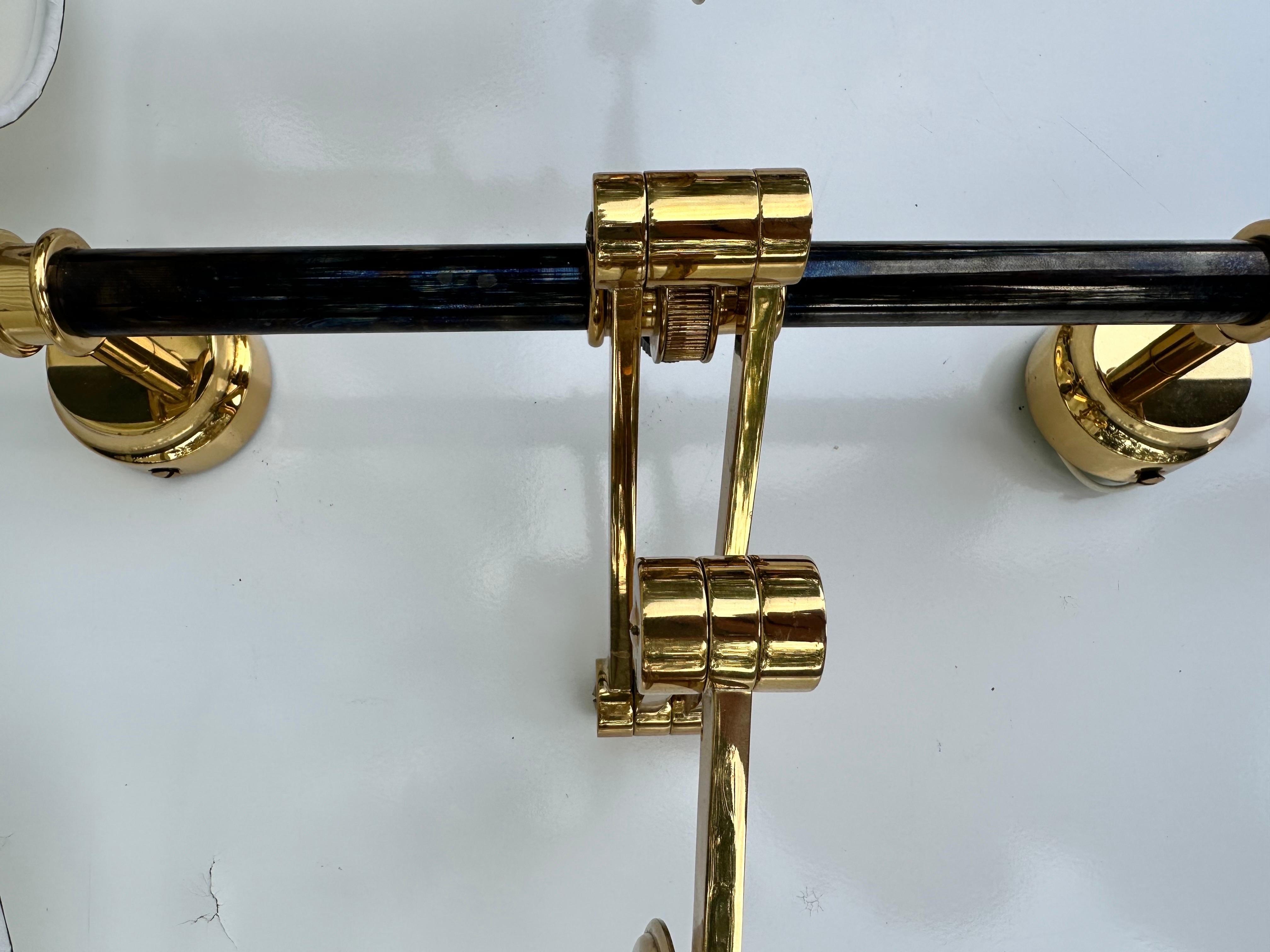Brass Pair of Maison Jansen  two Patina Retractable Sconces For Sale