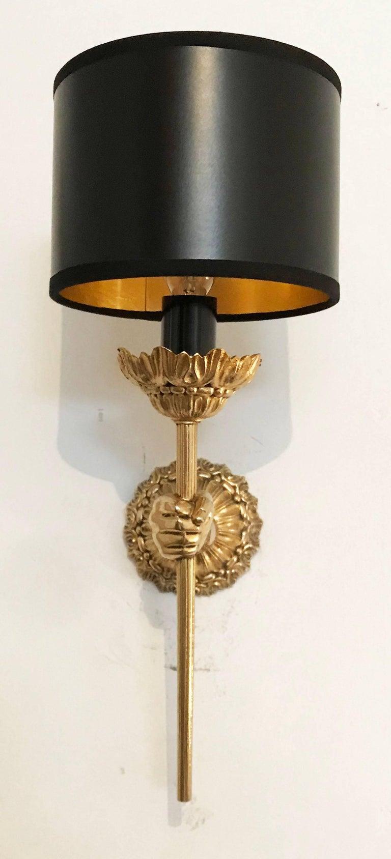 Pair of Maison Lancel neoclassical hand sconces, wall lights holding a torch.
Made in France in the 1960.
US rewired and in working condition
40 watts max bulb.
Priced by pair
Back plate: 3 inches diameter.
Custom back-plate available.