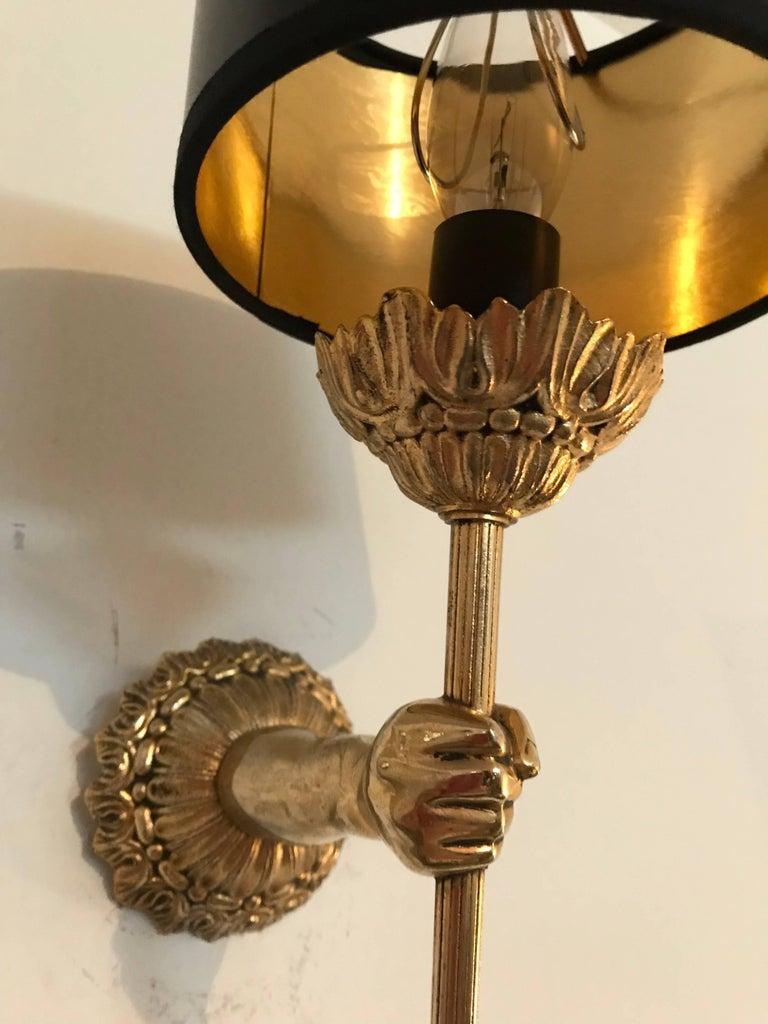 French Pair of Maison Lancel Sconces Brass Hand Holding Torch For Sale